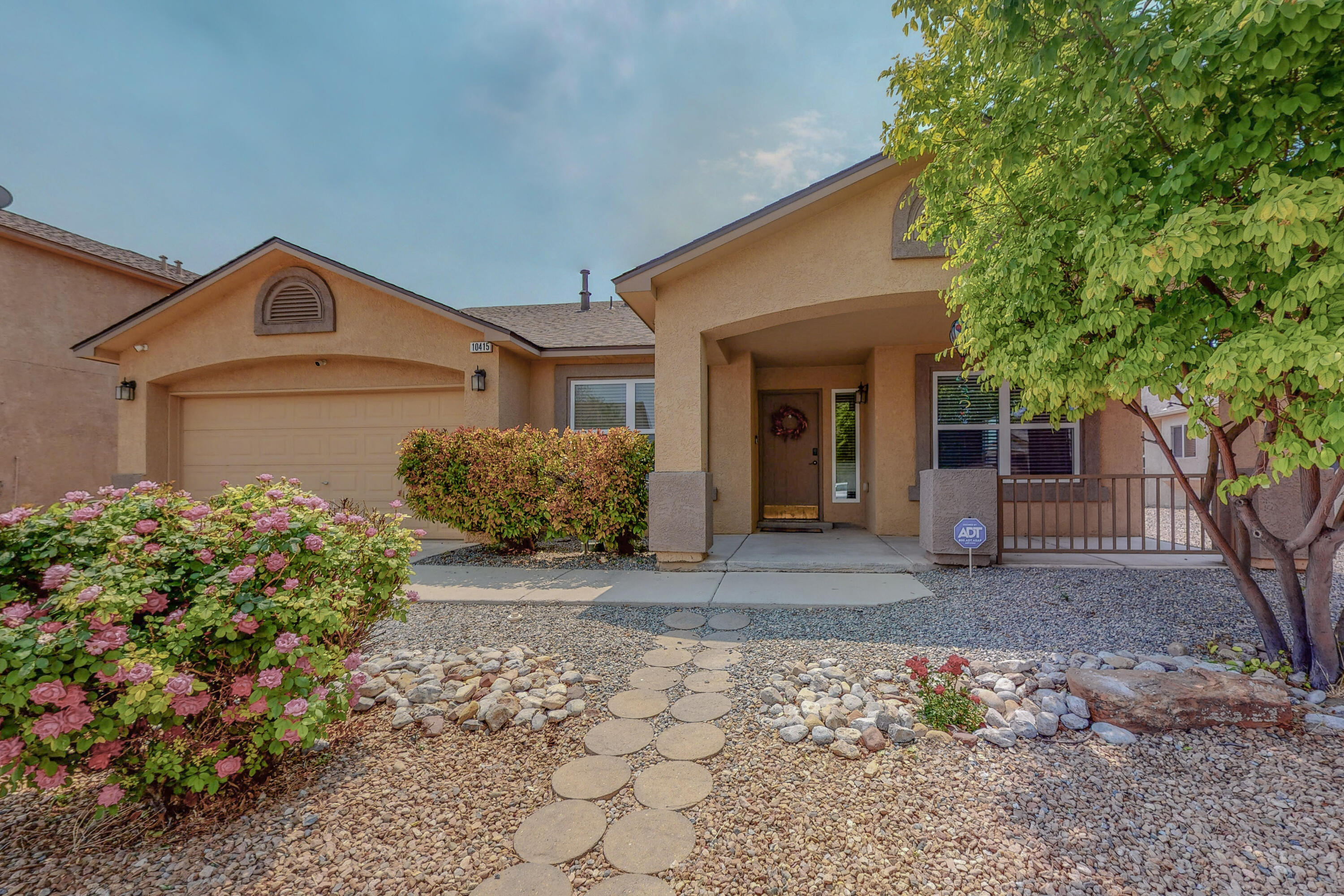 Welcome to this beautifully remodeled 4 bedroom, 2 bathroom, 2 car garage home.  This home is nestled in the beautiful Ventana West Community.  This community boast nicely landscaped parks (located walking distance from home) lots of walking/running trails.  The home was completely remodeled to include: Brand new roof installed with 20 yr transferable warranty, New flooring throughout the entire home, New energy efficient windows, New appliances, New LED light fixtures, New extended kitchen island with ALL new QUARTZ Countertops. All upgrades have been complete in the last 6-7 months.  Solar Panel installation was just completed getting the first bill from PNM for ONLY $8.00 this month.  Come and see this one as it will not last!!!