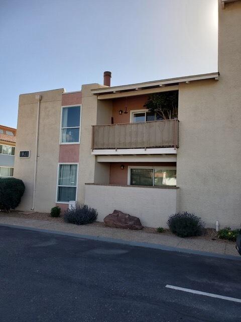 Move in and relax.  Quiet, easy care single story condo convenient to I-40 and UNM.  Private entry way with wrought iron gate. Generously sized living room adjoins quiet patio retreat.  Well appointed kitchen and so much more.