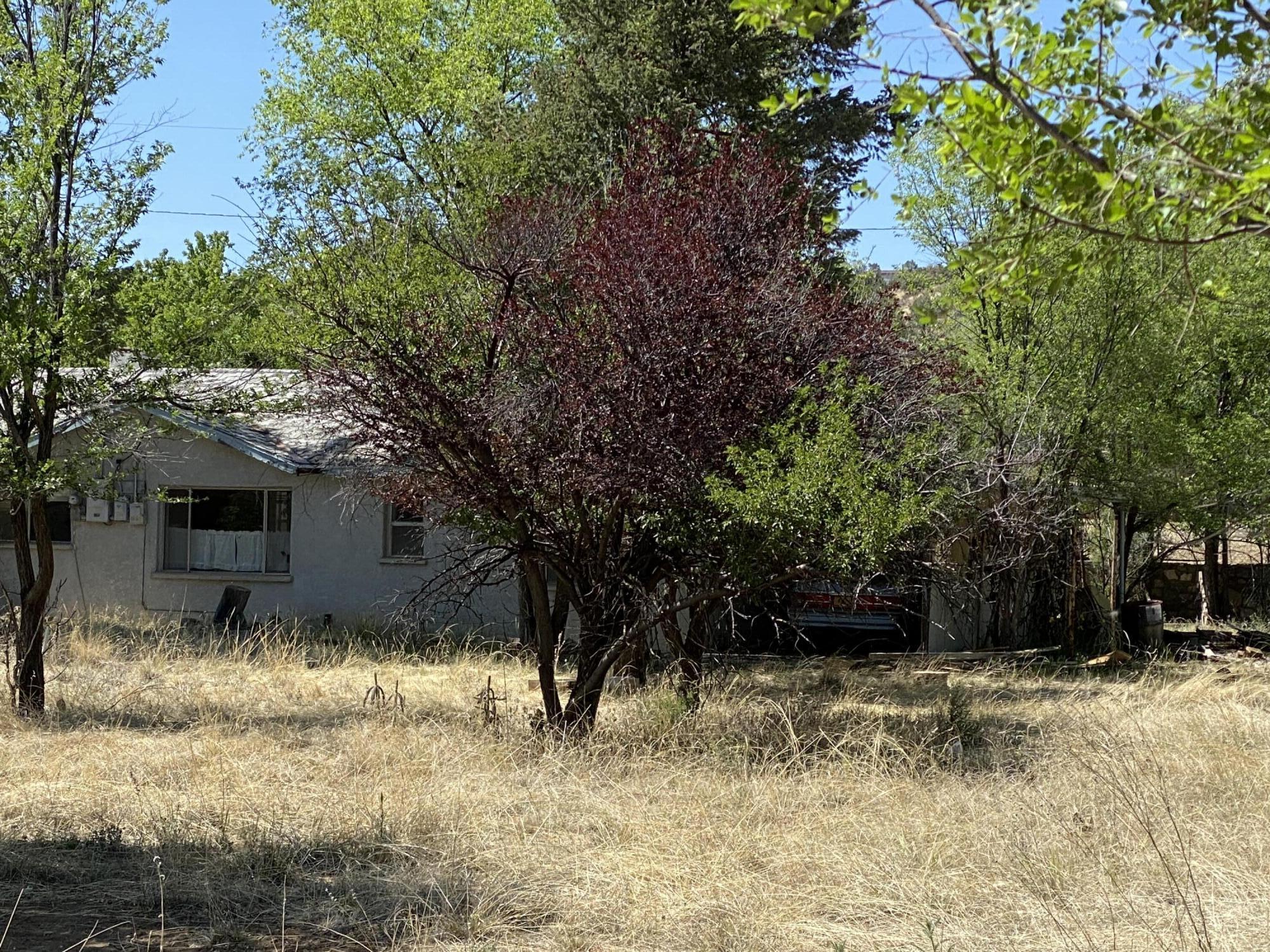 Site built home, partially remodeled and needs repairs.  2 bedroom 2 bath (full bath, 3/4 bath) home on .8 acre. Storage shed. City Water, Septic. Irrigation well. Carport. Sold ''As Is''. No repairs will be made by seller.