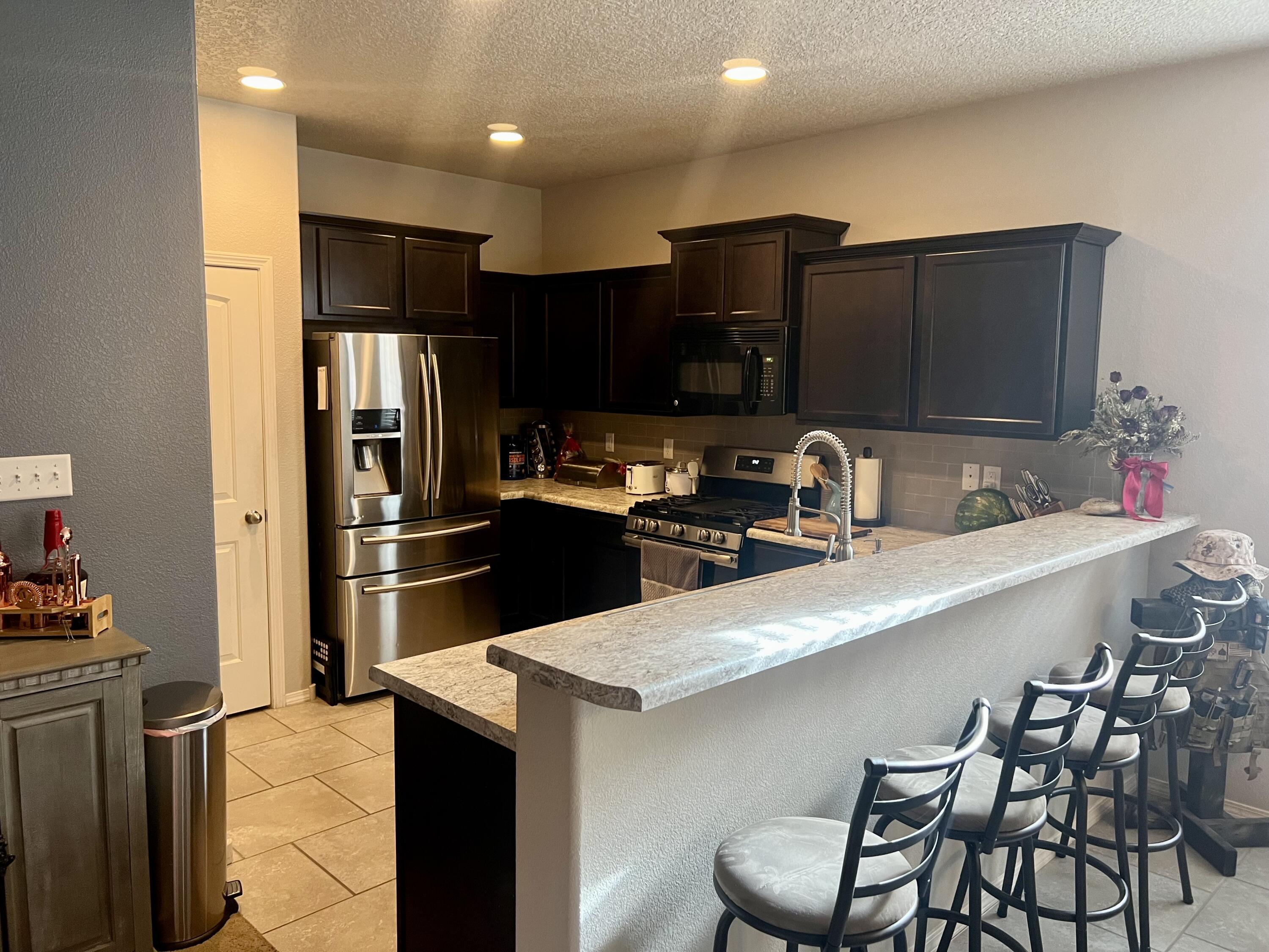 This home features an open floor plan, perfect for entertaining with a low maintenance landscaped yard, refrigerated air and new storage shed in the back yard. Garage has recently been painted & finished with a nice epoxy flooring.  Come take a look!!