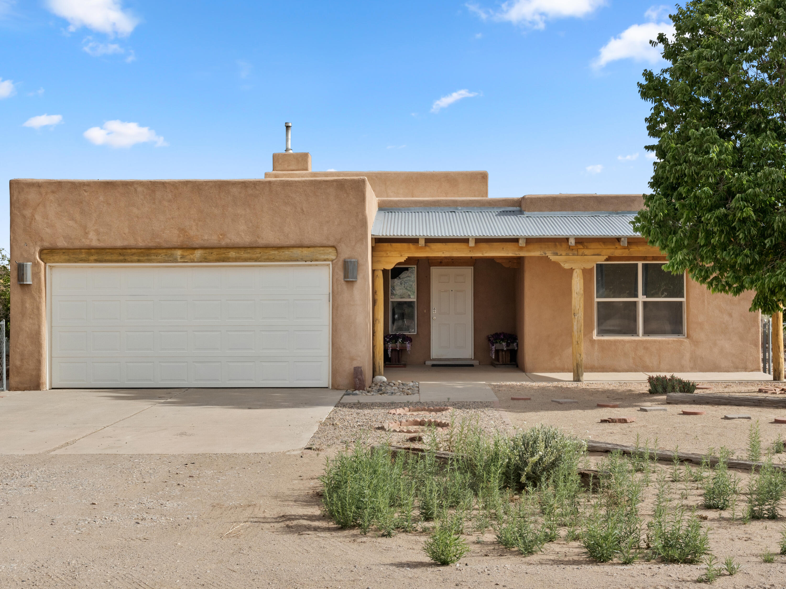 Custom Home on 1/2 AC lot.  This hidden Gem Awaits!  This 1600 S.F. 3 Bedroom 2 Bath Home is Custom Throughout.  It's Viga Ceilings and Kiva Fireplace create the perfect southwest  feeling yo9ur clients will love.Come and see this one while it's still available.