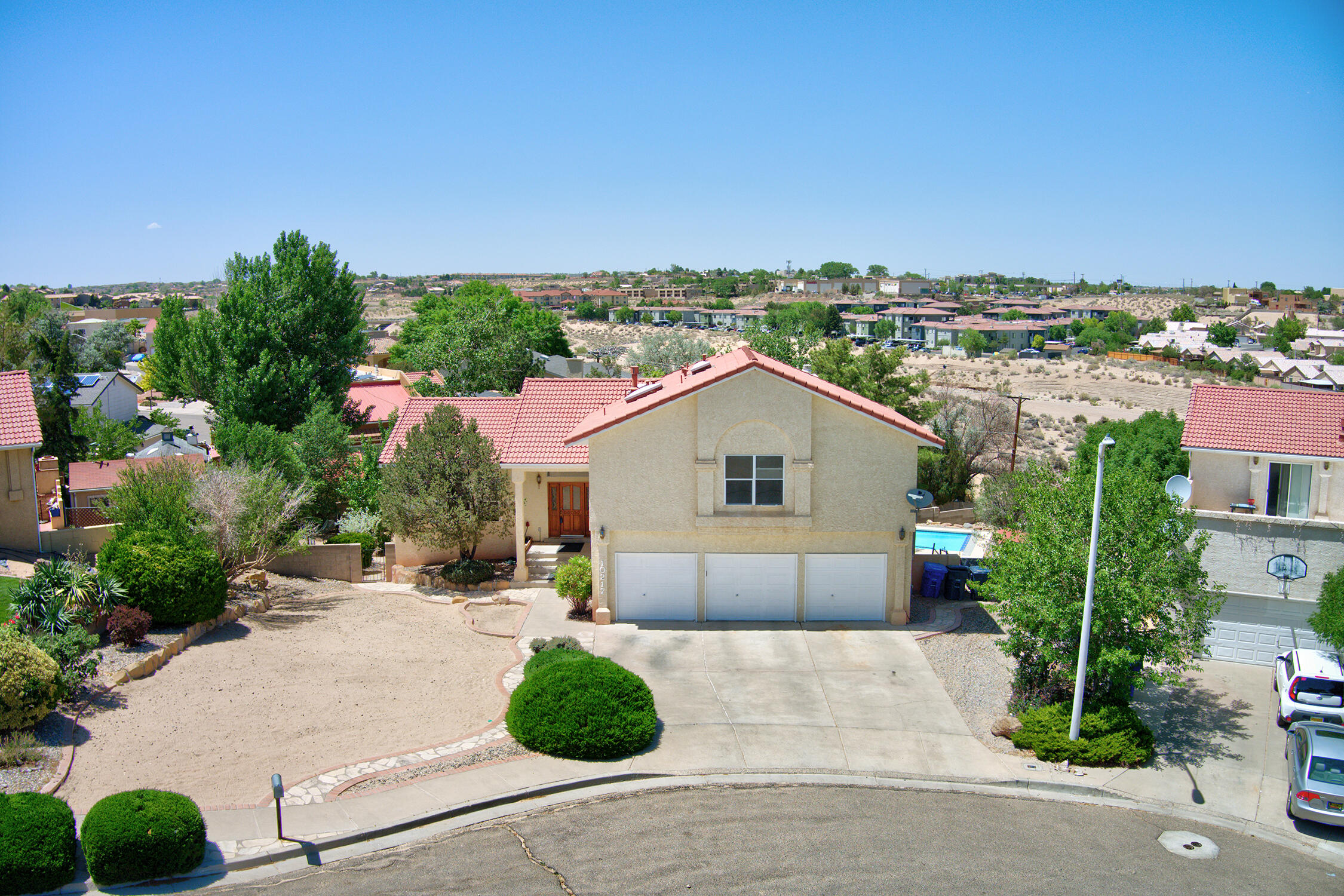 Welcome Home to this Wonderful home Nestled on a Huge Cul De Sac lot that backs to Open Space! The well thought out floorplan offers Multiple Living Spaces, 4-5 bedrooms & 4 bathrooms!  Everyone will surely want to gather around the kitchen with Granite Bar and a Nook that leads out to a Giant deck overlooking the Inviting Inground Gunite Pool offering forever Views and is perfect for Entertaining and BBQ's!  Retreat to the big Master Suite with window seat, Spa like bathroom, a Relaxing Garden Tub & walkin closet! Downstairs offers so many possibilities and would be perfect for a Rec Room that leads out to a Shady covered patio & the Pool!! Hot tub conveys. Ready for Summer Fun. This home has so much to offer! Needs a little TLC and is ready for your landscaping ideas.  Come see it today!