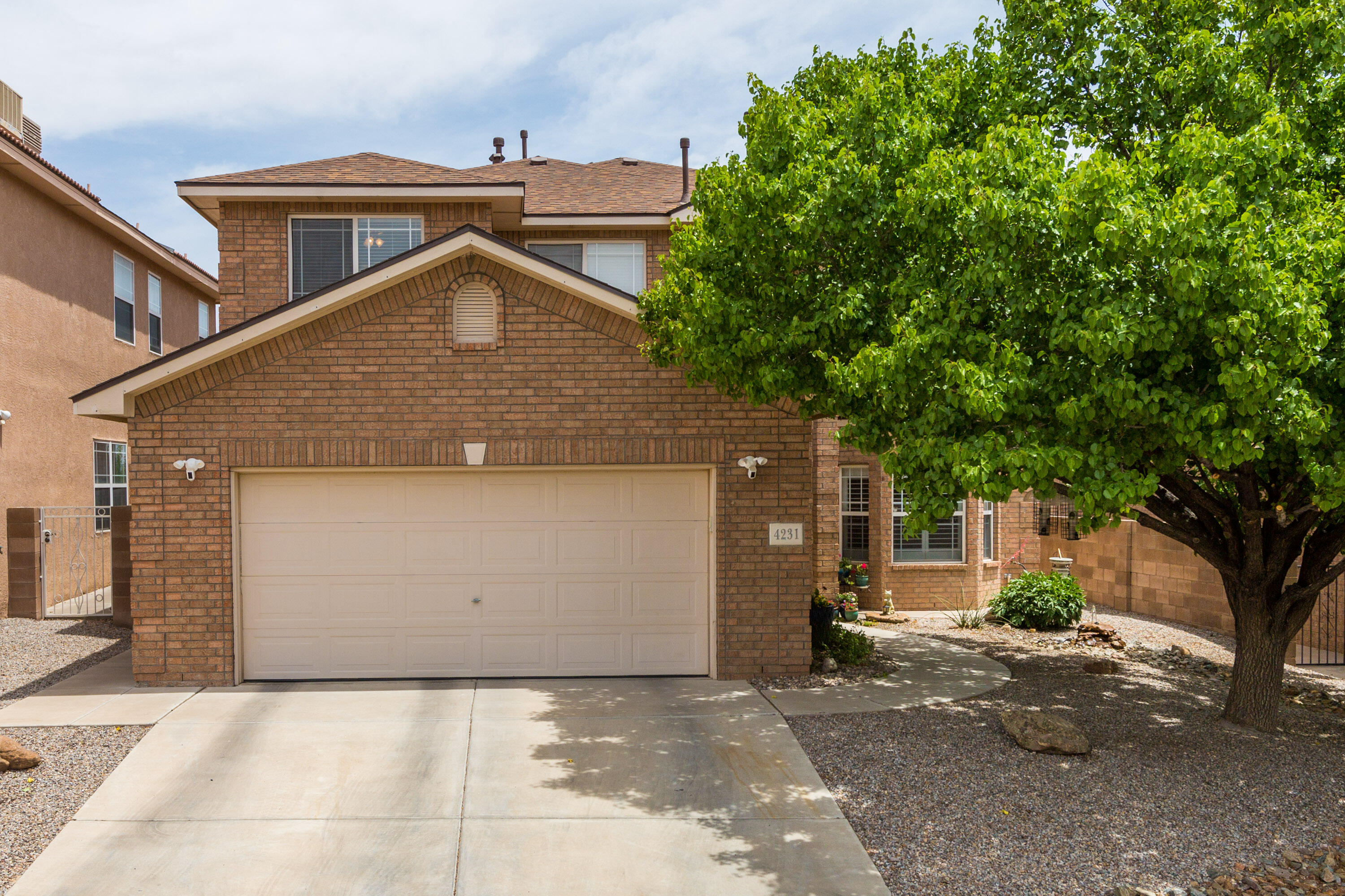 This stunning Stillbrooke home has left nothing undone. Updated bathrooms, Updated gourmet kitchen with SS appliances, custom cabinets and granite countertops. The entire downstairs has been done with travertine floors.  5 Bedrooms and 3 bathrooms plus an office, there is room for everyone. All of the bedrooms are good sized.  The bedroom downstairs has a 3/4 bathroom so it is perfect for a family member. In the master bedroom,  his and hers walk in closets and updated master bath, hardwood floors and travertine tile. Enjoy breathtaking views of the Sandias from the large living room and  the fully landscaped backyard.  Upgrades in the last 3 years: Travertine floors, kitchen remodel, bathroom remodels, 2 new mastercools, 2 new hot water heaters, new roof. See Update list in documents.