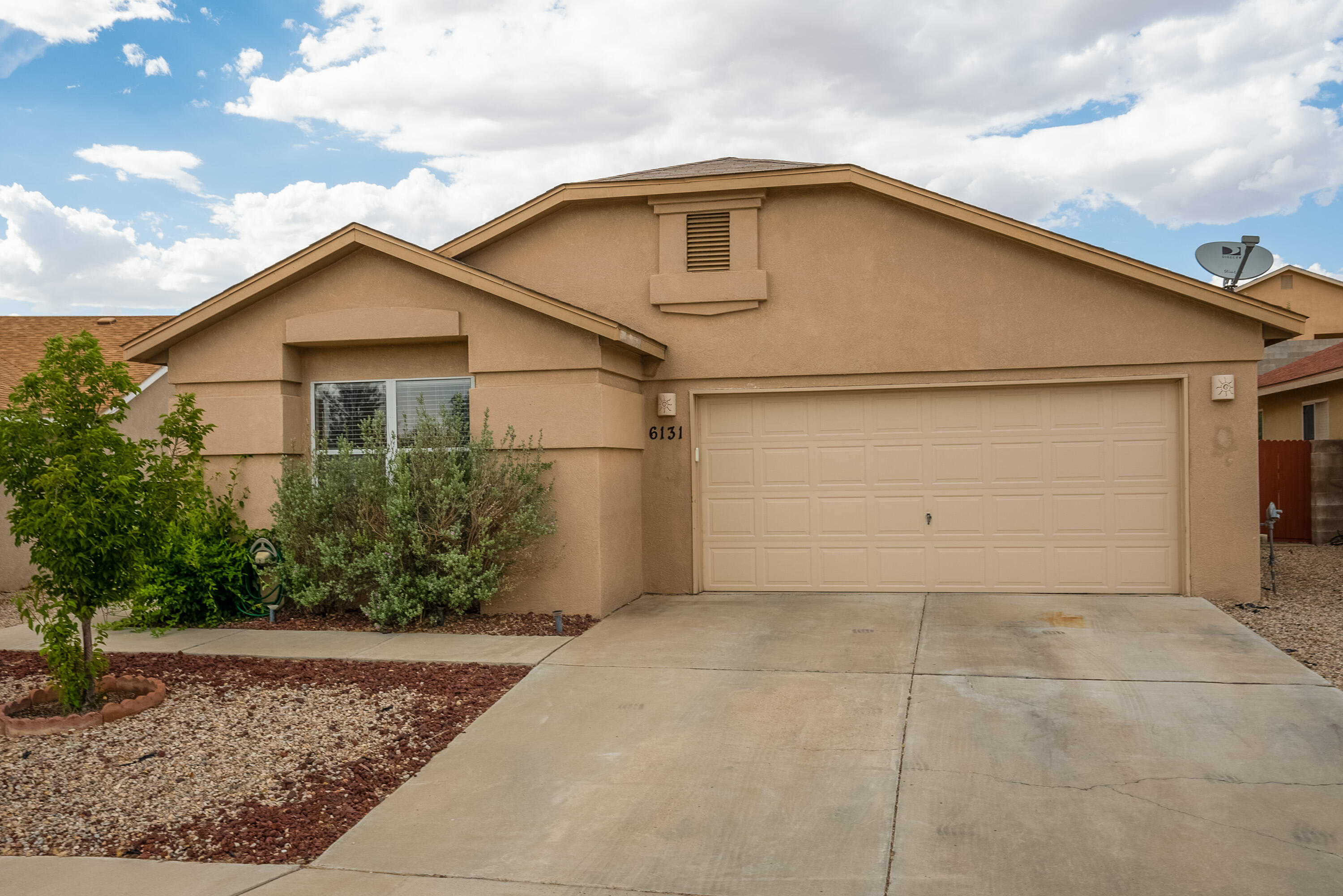 Wonderful move-in-ready single story family home located in the popular Tuscany West community! Home features 1,765sf with 3 bedrooms, 2 bathrooms and a 2 car garage. Spacious living area with updated floors and a gas fireplace. Kitchen hosts white cabinetry, ample cabinet space, upgraded stainless steel gas range, microwave, dishwasher and refrigerator. Family dining area right off of the kitchen. Owners suite with private bath. Bath hosts dual sinks and a relaxing garden tub! Two additional guest rooms! Fully walled and landscaped backyard with mature trees and a covered patio! Washer and dryer included.