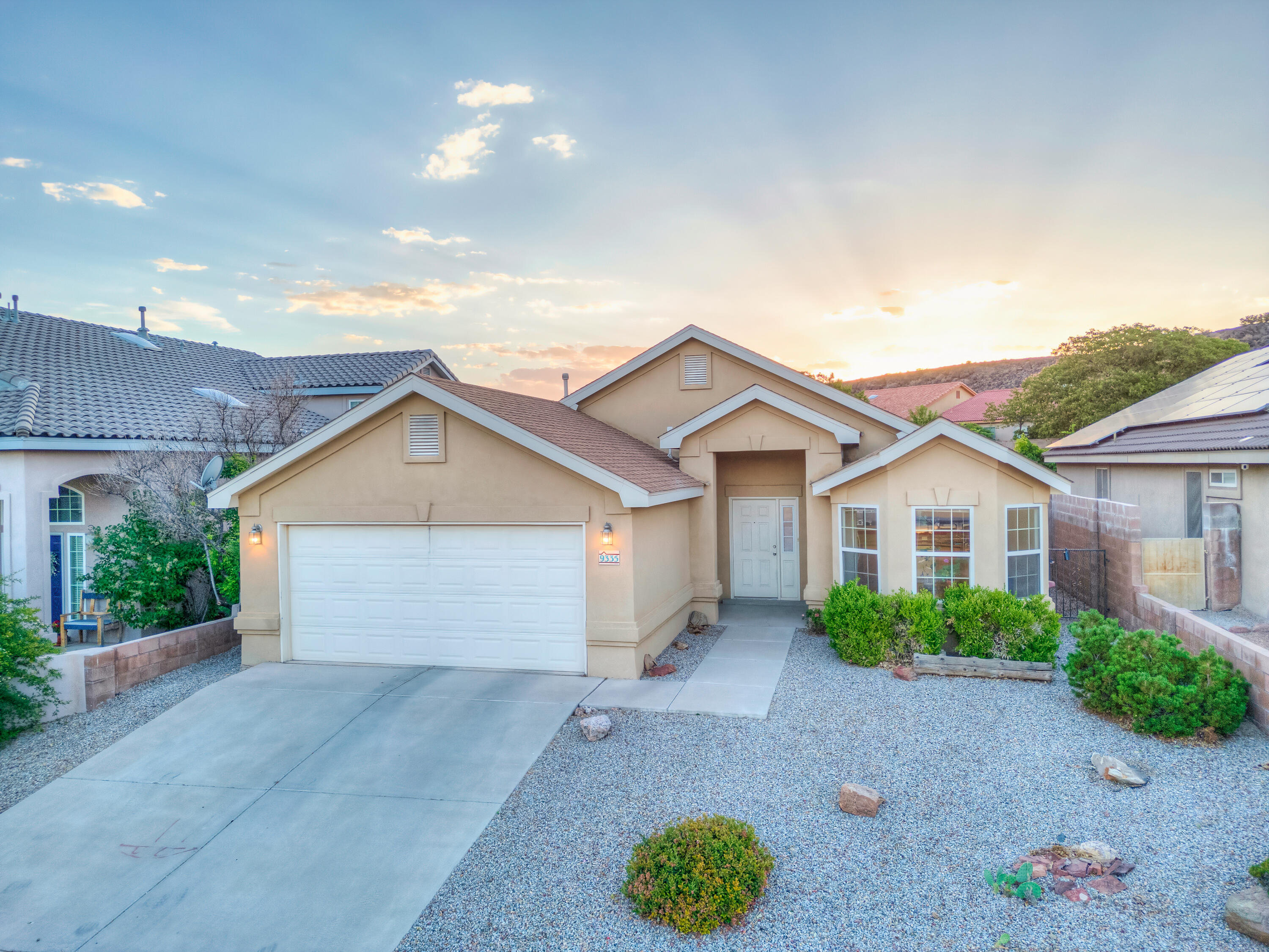 This beautiful Kim Brooks home has been well-maintained and cared for.  There is a nice big kitchen with dining area and bay window.  In addition there is a space for a formal dining room, flex space, or one big living room.  The living area has a nice vaulted ceiling and a plant ledge.  The floors are low maintenance concrete, but can easily be covered if desired.  The primary suite includes a tray ceiling and laminate floors.  The primary bathroom has a separate bath and shower, 2 sinks, and water closet.  The other two bedrooms share a good-sized full bath.  Make sure to check out the beautiful oasis in the backyard!  Nice covered patio and stone patio are great for entertaining.  This house is located in a private cul-de-sac, and close to shopping, and easy access to Paseo Del Norte.