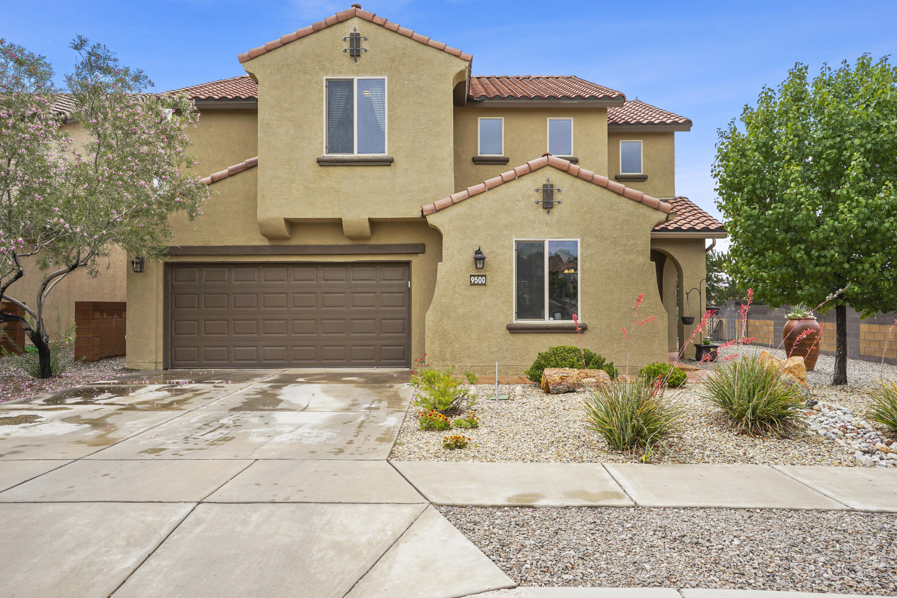 Corner lot in coveted The Boulders community w/ HOA & loads of curb appeal! Onyx model by Pulte Homes w/ functional, versatile floor plan. Privately situated 2nd story Primary Suite & loft w/ In-law suite, 2 spare rooms, & an office perfect for work or play on 1st floor. Energy efficient & eco-friendly Solar Power & Central Air keep the house comfortable year-round. Side street dead ends w/ access to sidewalks to bike, scoot, or walk to the community park. Landscaped & xeriscaped front & backyard w/covered patio for al fresco entertaining. The Boulders is a Pulte Homes community close to great schools & large parks, Unser Blvd., shopping, dining, & recreation. This home won't be on the market long--schedule your showing ASAP!