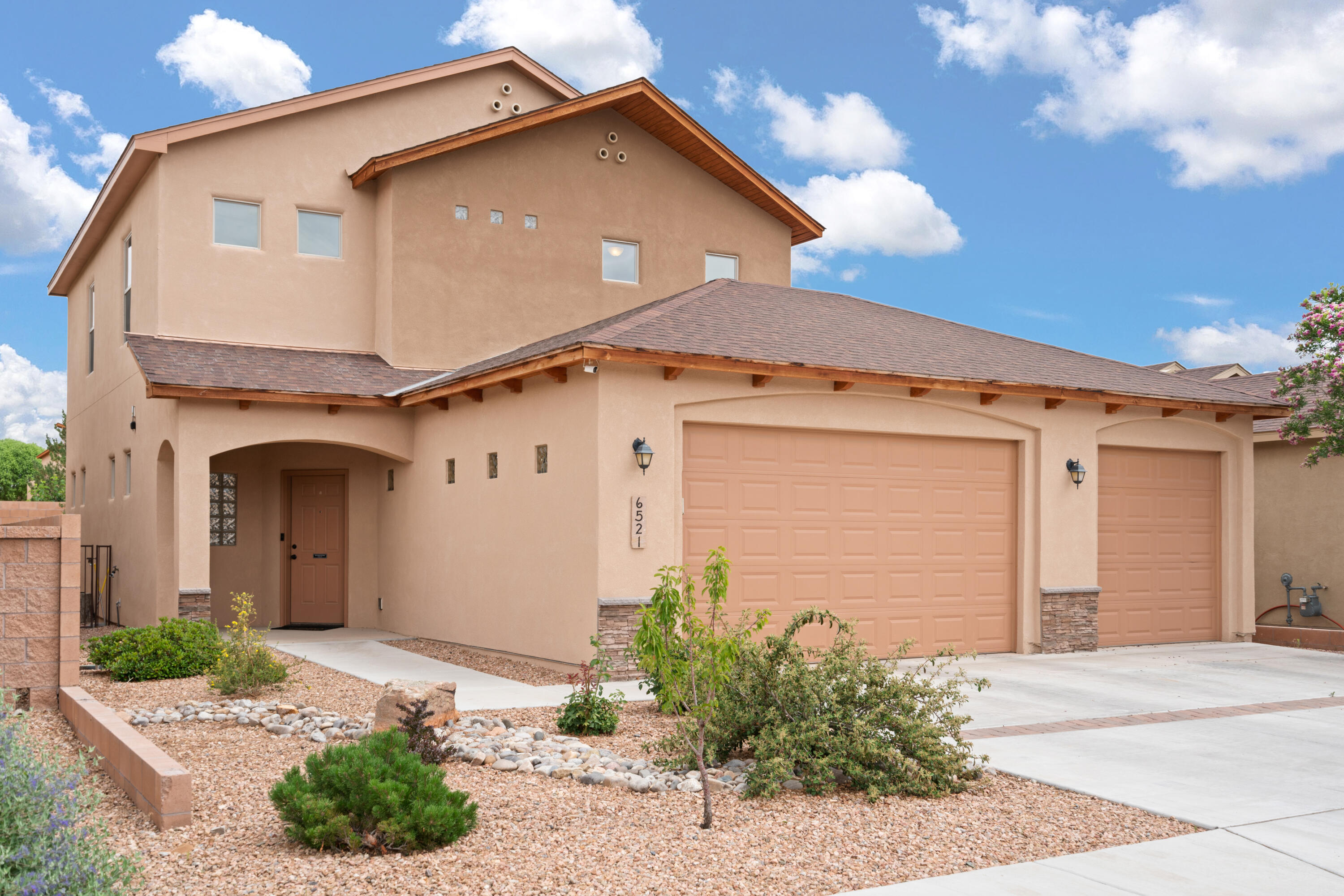 Custom Paul Allen green home built in 2016, with many added conveniences. Build-Green NM Gold Standard For those low utility bills. Refrigerated Air, Low-E Windows, Tankless Water Heater, and high R-value insulation in walls, and roof. Beautiful, low maintenance back yard features pet friendly turf, a huge covered patio, and a built-in BBQ for all those big family get togethers. Plenty of room for your workshop, or toys in the oversized 3 car garage, with a 220volt outlet for your electric car! Desirable, newer west side neighborhood, with no PID. Call your Realtor to come see it for yourself.