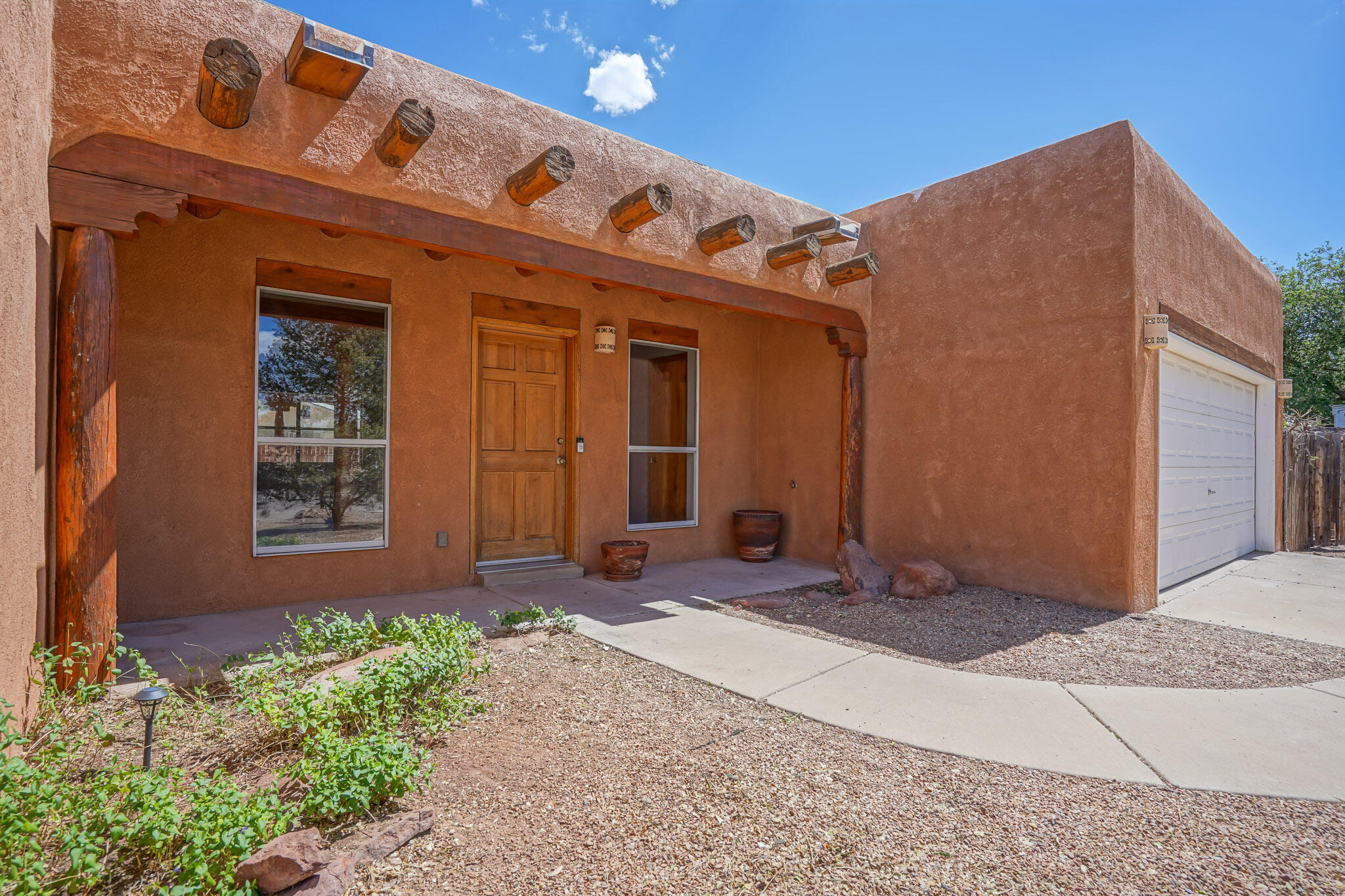 Open House canceled. Rare, amazing, beautiful Alameda custom- home.  Wake up to balloons hovering over, while you enjoy the beauty of the North Valley.  Hardwood floors, Saltillo tile, wood burning stove, tongue & groove build, and all you imagine a North Valley home to be.  Enjoy irrigation rights, back yard access, privacy and Sandia Mountain Views! Quick access to Alameda and I-25. Schedule a private showing today!