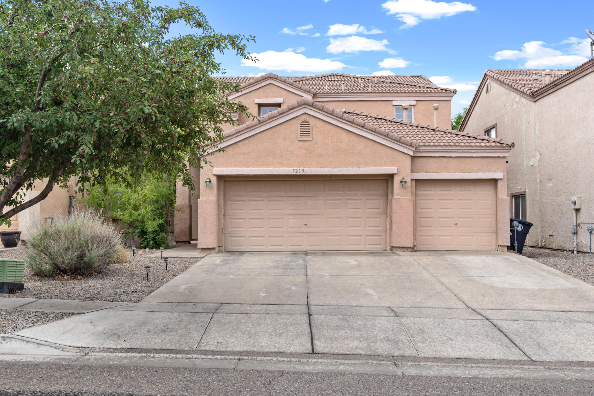 Great 4 bedroom 3 bathroom home in the Volcano Vista school district in NW Albuquerque!  3 car garage and a bedroom on the bottom level!  Serene backyard with open patio and turf area.  Gas cooking, built in microwave, and refrigerator in kitchen included!  Open concept floorplan with no carpet downstairs!  This home will sell fast, schedule your private showing today!