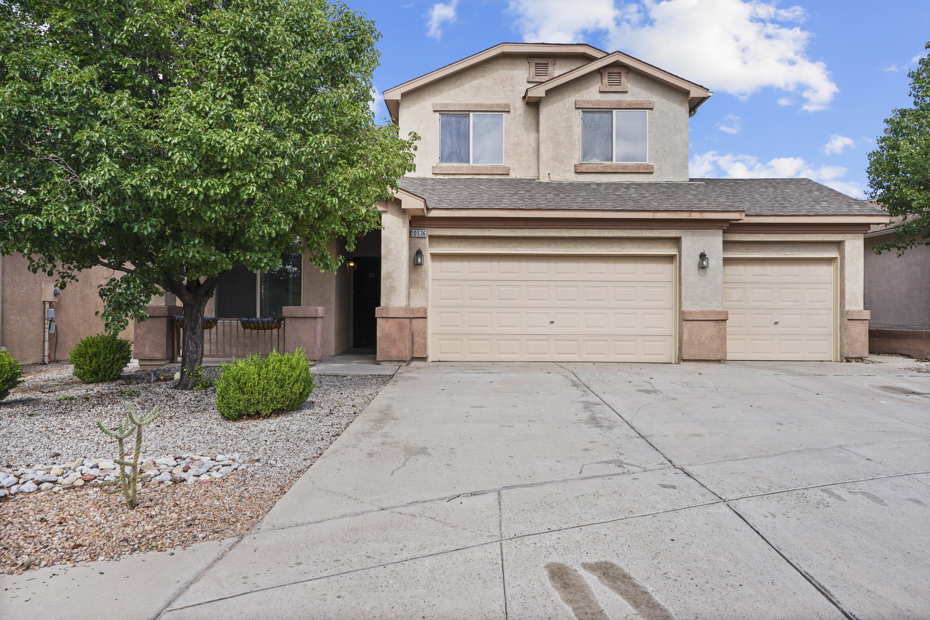 Beautiful home in Ventana Ranch West! This home features unobstructed mountain and city light views, a three-car garage, xeriscape backyard, and laminate flooring throughout the entire home, with carpet in the master bedroom closets. Private balcony off the master bedroom, fireplace in the main living room and master bedroom. Tankless water heater installed in 2018.