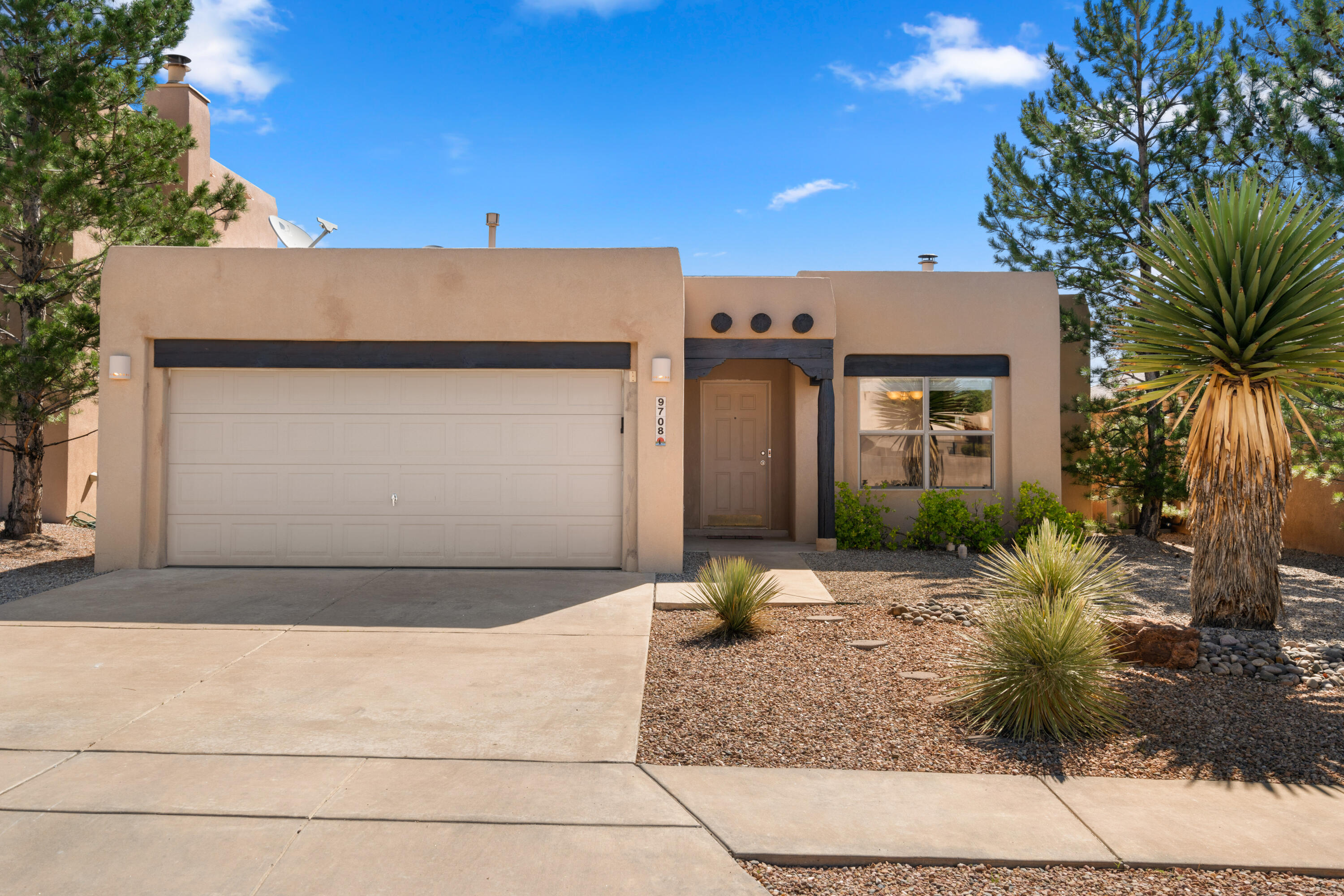 Ventana Ranch beauty is ready to be yours! This lovely Raylee home is settled in a quiet cul-de-sac near parks, walking paths, and more. Open kitchen features breakfast nook, upgraded stainless steel appliances and newly painted cabinets with modern hardware. The fantastic great room boasts tongue & groove ceilings, wood vigas and a modern-yet-classic kiva-style fireplace. Fabulous master suite has a cozy 2-way fireplace, roomy walk-in closet, and a newly remodeled bathroom with a brand new garden tub and gorgeous new tile work. Second FULL bath is a jack and jill opening to both bedroom wings. New flooring throughout much of the home. Relax on your covered back patio with sweet lawn and mature landscaping. Sellers have left no stone unturned. Come see today!