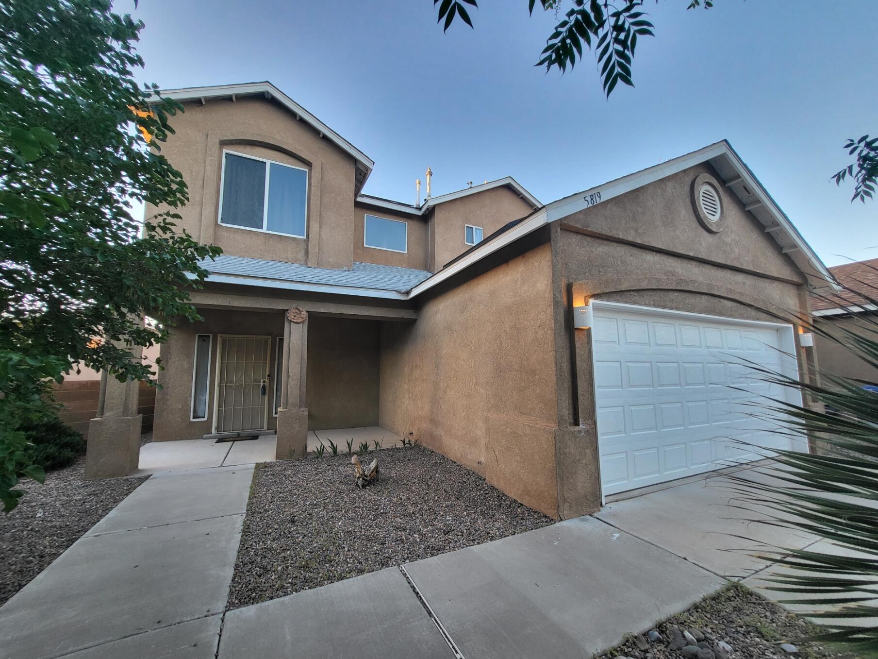 New roof, solar, garage door opener and water heater in 2021! Come see this comfortable home in an awesome location just blocks from Unser and McMahon, with plenty of restaurants,  conveniences, and shopping nearby, as well as easy access to both Albuquerque and Rio Rancho. Home is at the end of a cul-de-sac with an oversized lot, and a large back yard with ample patio space. Featuring a large main living area and comfortable kitchen, 3 bedrooms, 2.5 baths, and a double garage.