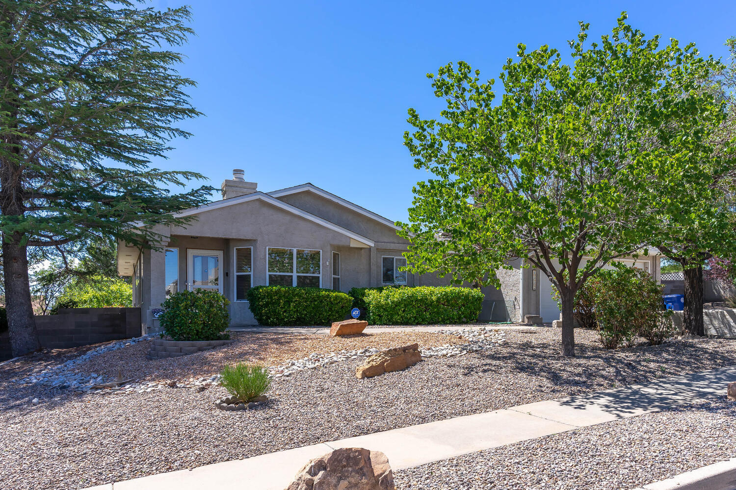 Welcome home to this lovely, well maintained single level gem, situated on a large corner lot with double gate for backyard access & RV parking! Step inside and you will feel right at home! Discover a formal dining room & living room with fireplace! The generous size kitchen offers a pantry, NEW flooring, breakfast area and atrium door opening to the 11 x 10 finished sunroom with access to the master bedroom & backyard! NEW carpet! Generous master bedroom with walk-in closet & a 3/4 bathroom offering double sinks and large shower! Amazing .22 acre lot with great spaces for gardening or entertaining with multiple open patios, mountain VIEWS, turf,  terraced landscaping & storage shed!  Refrigerated air conditioning! Service room & a 2 car garage!  NICE!! Minutes to Costco, Cottonwood mall!