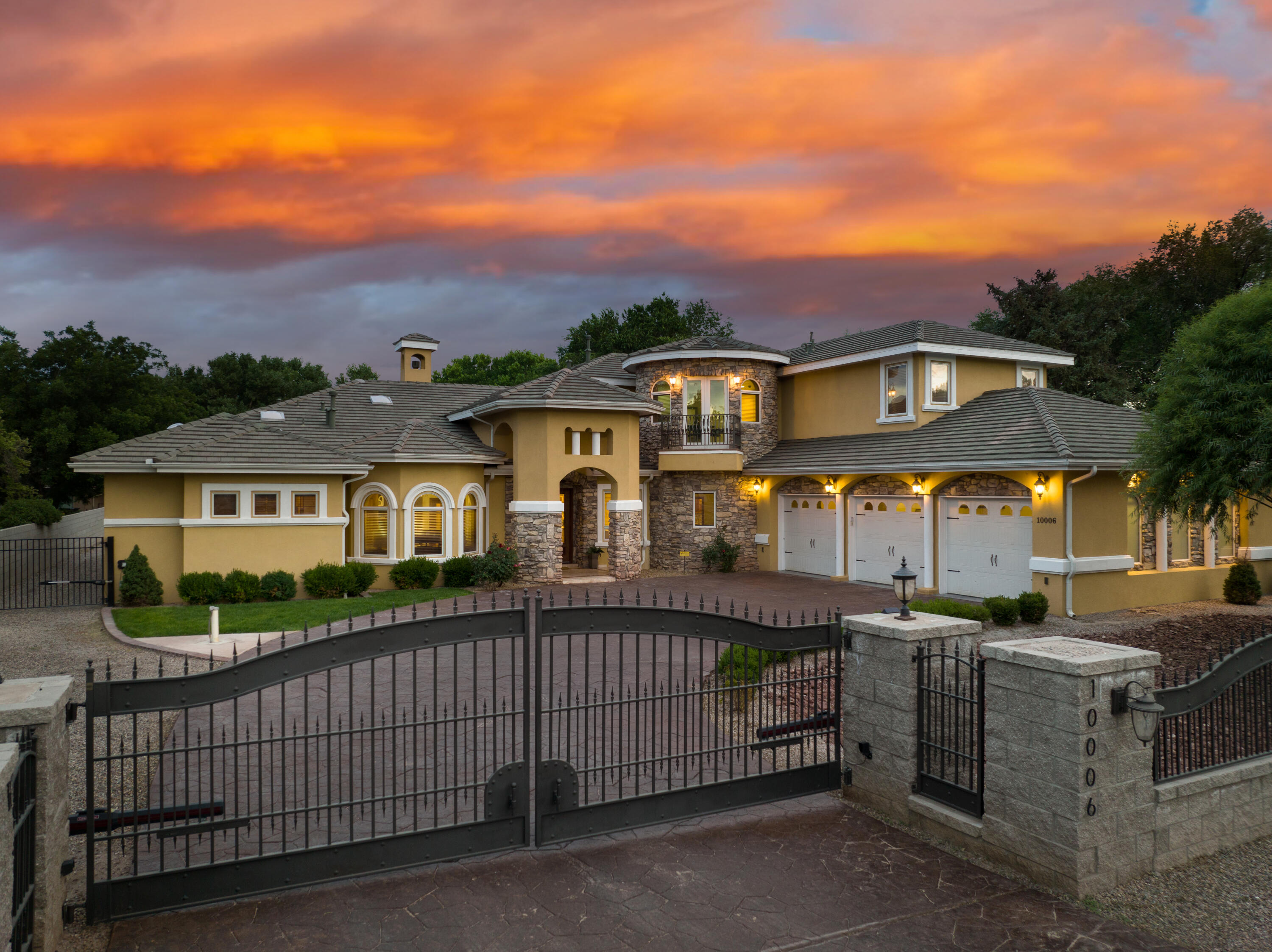 Stunning Custom home with over 7,000 square feet of elegant living space situated on 1 acre! Multiple living areas, a media room, Workout space, loft area, office or library space with built-in shelving! Chefs' dream kitchen! Built-in Microwave and oven, Instant hot water over the 7 burner gas cooktop, Large Kitchen island, and built-in wet bar! Must see Private Owners retreat! Walk-in closet, water closet! The jetted tub and snail shell shower will leave you feeling like you just stepped into the spa! This fantastic property backs up to the  Rio Grande River with access to the Bosque, biking & horse trails! The large covered patio space in the backyard is the perfect place to entertain with a built-in kitchen and bar seating! There is also a 1,152 sq ft Casita with Kitchen and 3/4 Bath!