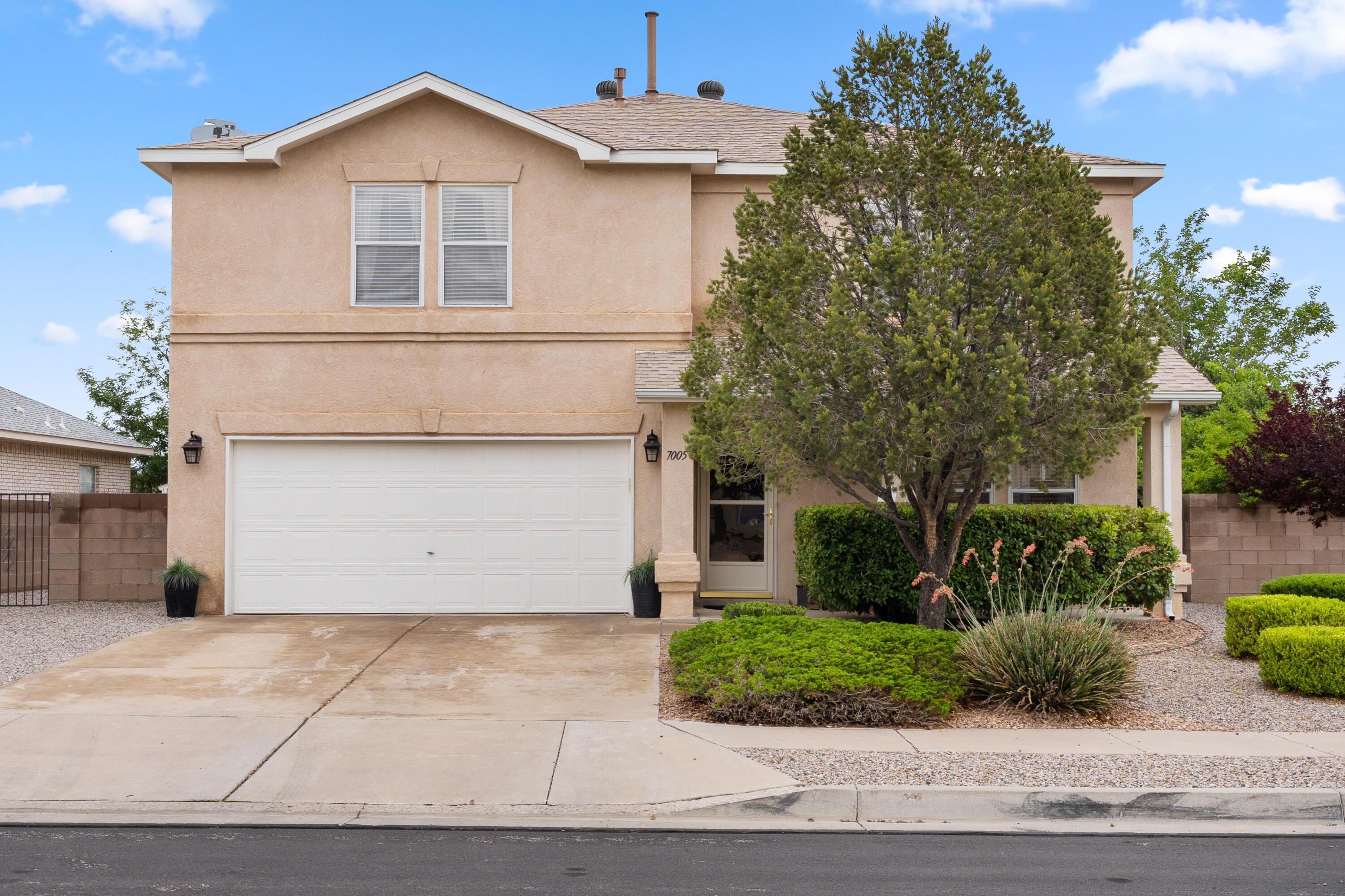 Single owner home glows w/pride from the curb to the landscaped backyard! Turnkey w/ fresh color palette, this is a canvas waiting to bring your interior vision to life. Kitchen boasts an entertainer's layout w/island, bar seating, granite, ample counter & cabinet space, black stainless appliances, & breakfast area open to dining & living. Step thru sliding glass doors to your covered patio overlooking a lush oasis. Built-in shelves & buffet between living & dining are perfect for parties & display. Windows fill house w/natural light. 3 Generous rooms upstairs can be anything you need. Loft is perfect for work or play. Primary suite is a secluded retreat, complete w/private terrace thru French doors & beautifully appointed ensuite. Close to parks, open spaces, shopping, & recreation.