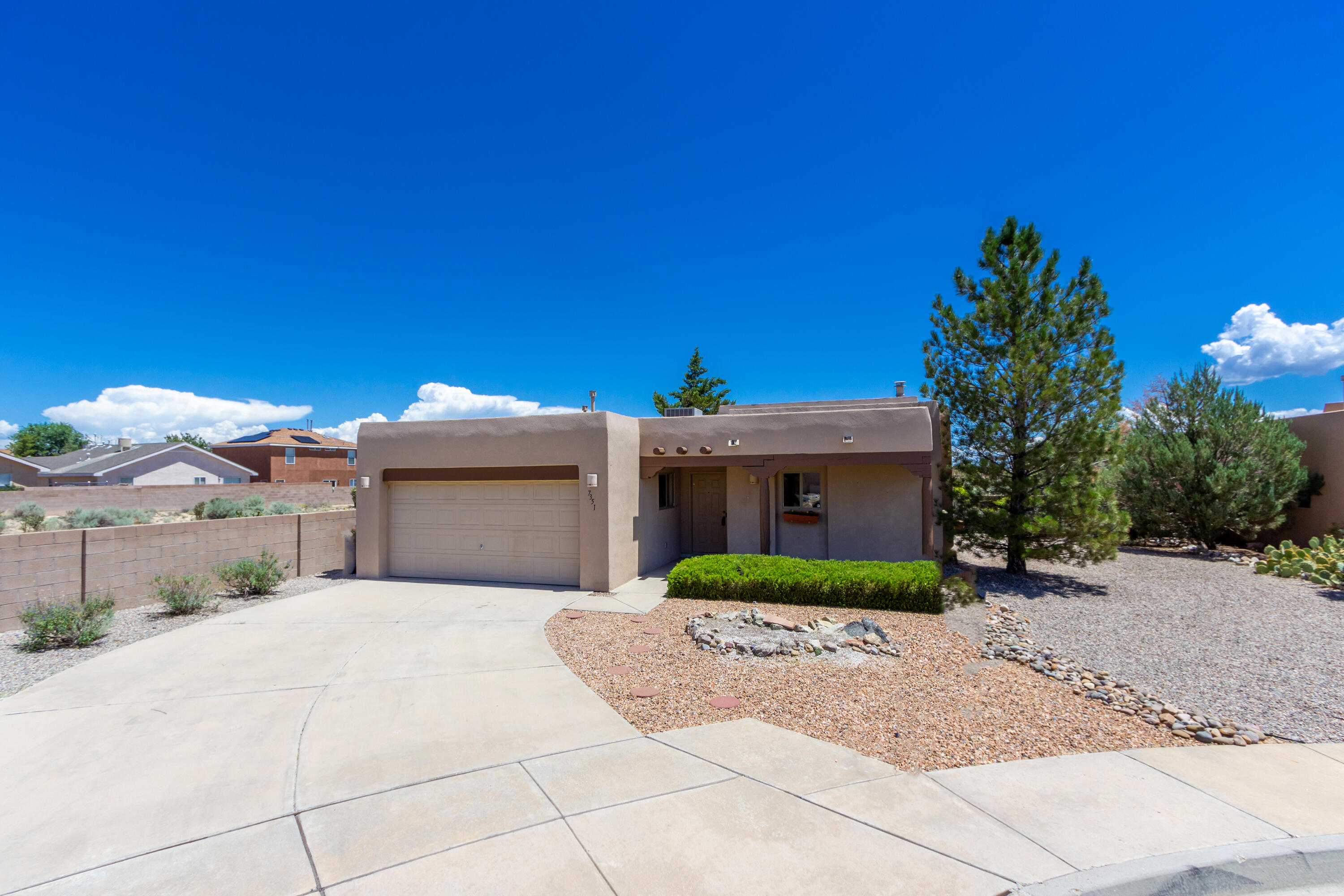 Welcome to Ventana Ranch! This lovely southwestern-style home features 3 bedrooms, 2 bathrooms, 2 car garage and a casita! Step inside and you will be greeted by the kitchen which features a kitchen island and plenty of cabinet space. Pass thru and you will find the separate dining area that is open to the spacious living room which features a kiva fireplace and ceiling vigas. On the left wing of the home you will find 2 additional bedrooms and a full bath that converts to a convenient bathroom for guests or a full bath as needed. The owner's suite provides plenty of room and features a double-sided fireplace and an en-suite bathroom that features double sinks, garden tub, separate shower, and large walk-in closet. Step outside and you will enjoy a covered porch and a large back yard that