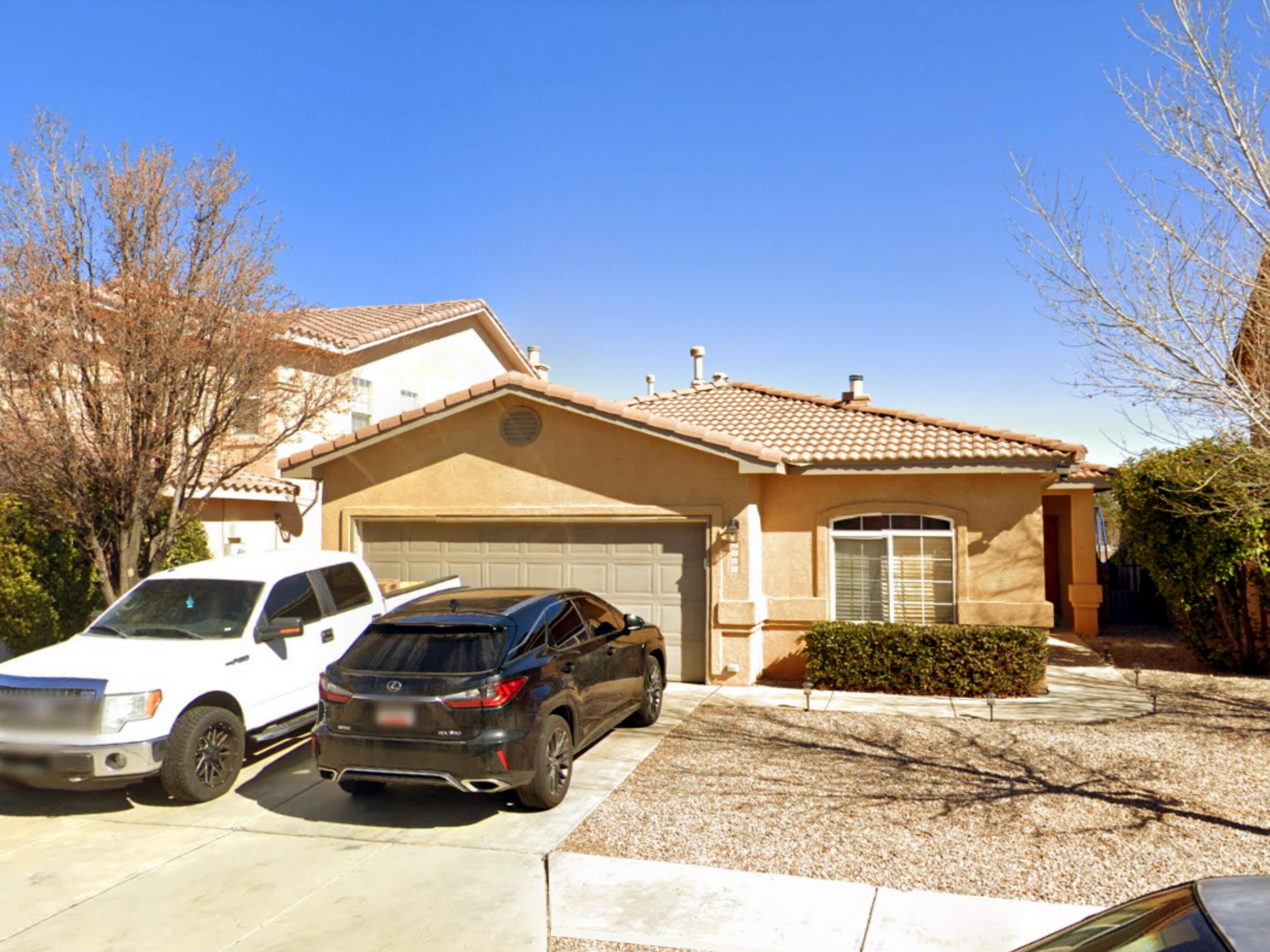 Here's a wonderful 1-Story, 4-Bedroom, 2-Car  Garage Home with a Great Room Floor Plan!  It features High Vaulted Ceilings over and Spacious Living area with a Cozy Fireplace, New Flooring, Fresh Paint!  The Kitchen and Bathrooms have Upgraded Fixtures!   Everything is order!  The Very Secure Backyard is Elevated and has a Fantastic View of the Sandia Mountains!  Beyond getting a Beautiful Home in a Super Location, the new owners will appreciate that this home is ready to go!   Hurry, come and see...