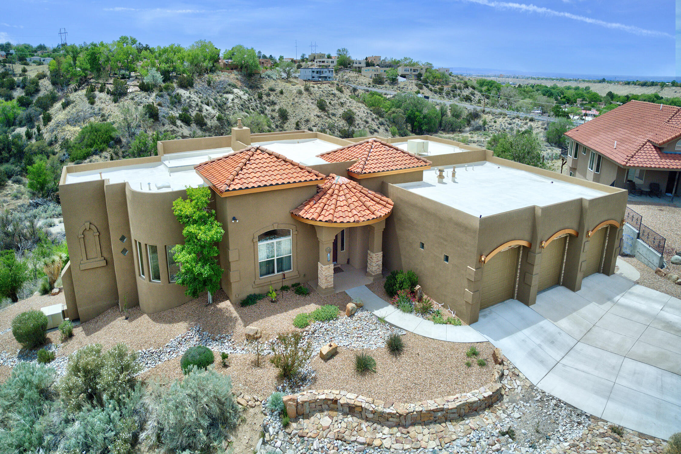 This custom-built OUTSTANDING home is luxury at its finest! Your private paradise, Hanging off the Buff for VIEWS, includes- Swim/Pool Spa, Sauna, and Theater!! Attention to detail is truly impeccable and very artistic. The home has a great layout and lots of natural light and great views and lots of storage.   Open floorplan includes a grand living area with wall of windows, and it opens to a view deck with grill and Dream Kitchen you just must see!  Luxurious Owner Suite with a spacious bath and 15 x 6.10 walk-in closet! Plus, a 2nd Separated Owner Suite, 2 laundry rooms and an office, 3 car garage + so much more! You'll enjoy all the luxury amenities.  The home backs to open space and has incredible views.  Come see this one-of-a-kind home in Four Hills with Golf Course and Country Club