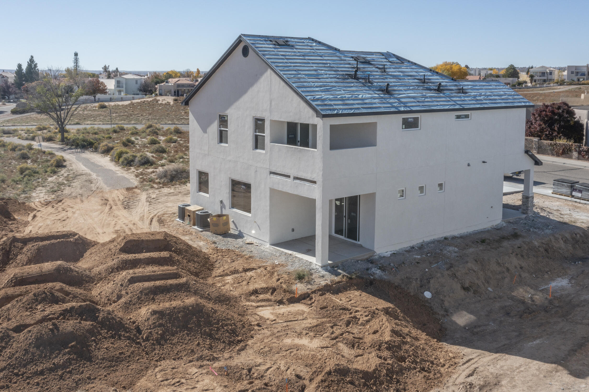 ASK ABOUT THE BUILDER INCENTIVES! Located at 344 Pinnacle Dr SE Rio Rancho you will find the Taos floorplan offered by Amreston Homes. Inside this 2354 Sqft Floorplan you will find 3 spacious bedrooms (including one of the largest Owners Suites Amrestonhas to offer 22.5x13.5), an office, and 2.5 Baths. The lower level of this floorplan is perfect for entertaining. Each space flows to the next and includes a 1/2 bath to ensure personal privacy upstairs. All the standard features are sure to impress which include: 12x24 tile, Tiled showers to the ceiling, Granite, Stainless appliances including the fridge, and more! This home is under construction and some photos are not of the exact home, but rather examples of the floorplan and finish work of the builder. Finished product may vary ba