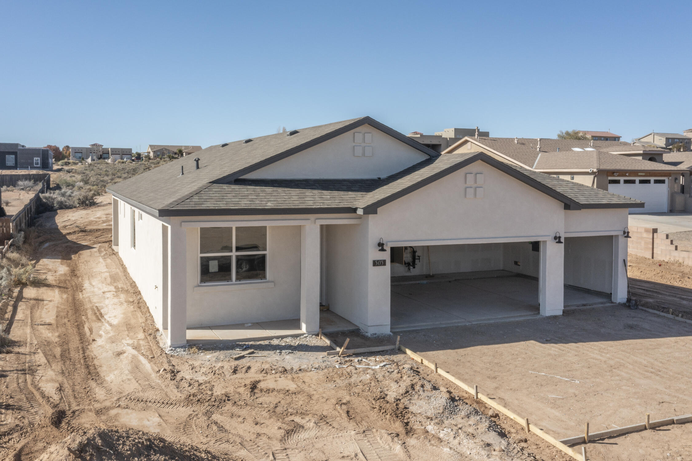 BE SURE TO ASK ABOUT BUILDER INCENTIVES. Welcome to 505 4th St in Rio Rancho. This is the San Juan floorplan built by Amreston Homes. This 3-bedroom 2.5 bath home has 1651 sqft and a 3-car garage. Bring your toys to enjoy on this .5-acre lot with no HOA. This home will have Kona-stained cabinets in all the standard locations as well as 12x24 tile in the wet areas. The shower surrounds will have 13x13'' tile up to the ceilings. The spacious owner's suite is 16.5x13 and will comfortably fit most any bedroom set. The kitchen will have granite standard with the sink and dishwasher located in the island. Some photos are not of the exact home, but rather examples of the floorplan and finish work of the builder. Finished product may vary based on material supply.
