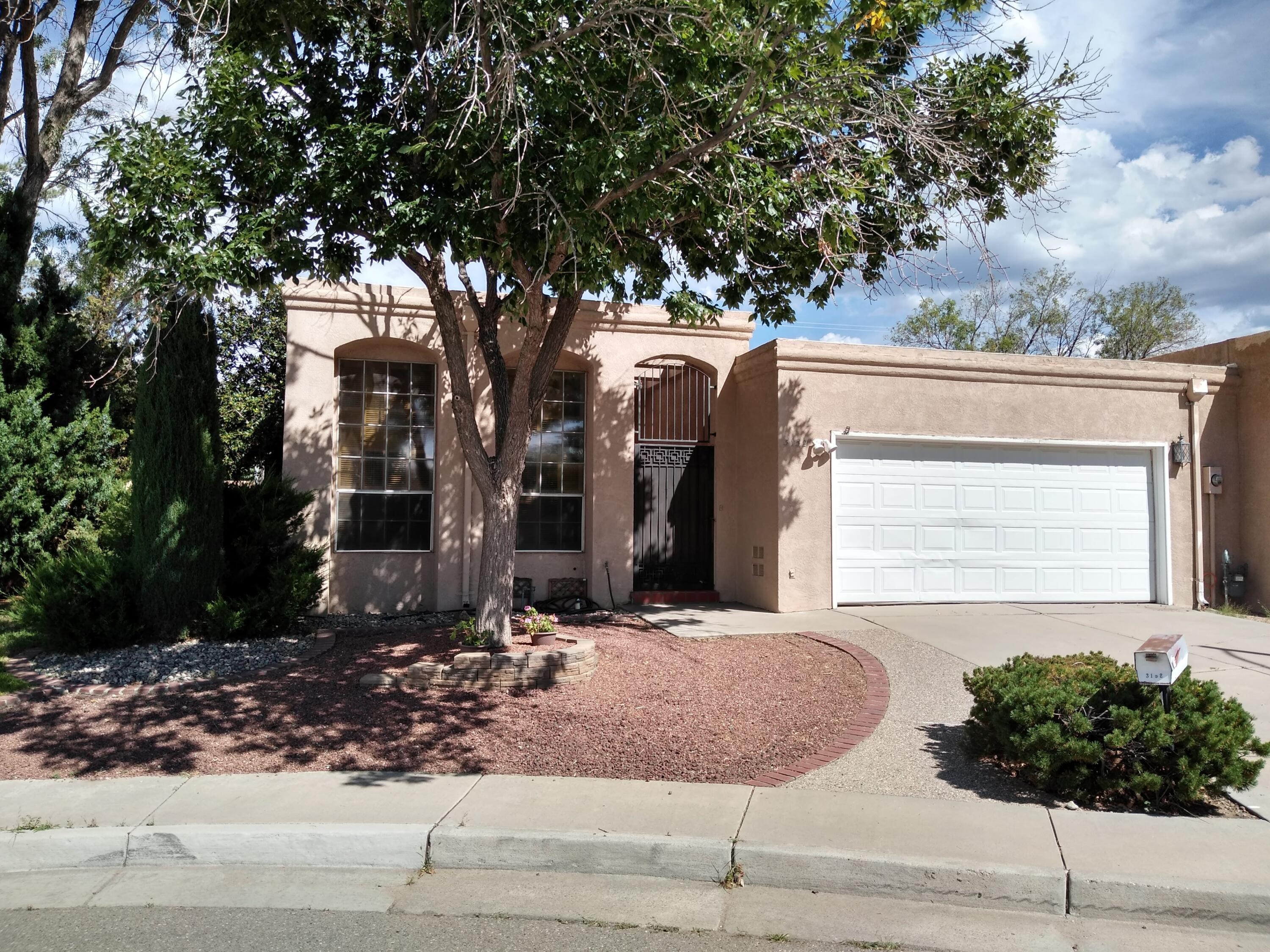This beautiful Mossman townhome lies just minutes from Albuquerque Uptown!  It is a great floorplan with plenty of natural light & features raised ceilings that really make it feel open & airy!  It has a 3 bedroom layout, with one currently being used as an office.  The kitchen is large with plenty of cabinets & countertop space.  It also has a great breakfast nook area.  All of the appliances convey with this home, which includes the washer & dryer.  The backyard offers a great covered patio & plenty of open patio, making it a perfect place to enjoy the wonderful weather. The roof is less than 2 years old, the water heater is less than 1 year old, & the heater/refrigerated air combo unit was added approximately 6 years ago. The home is being sold in as-is condition.