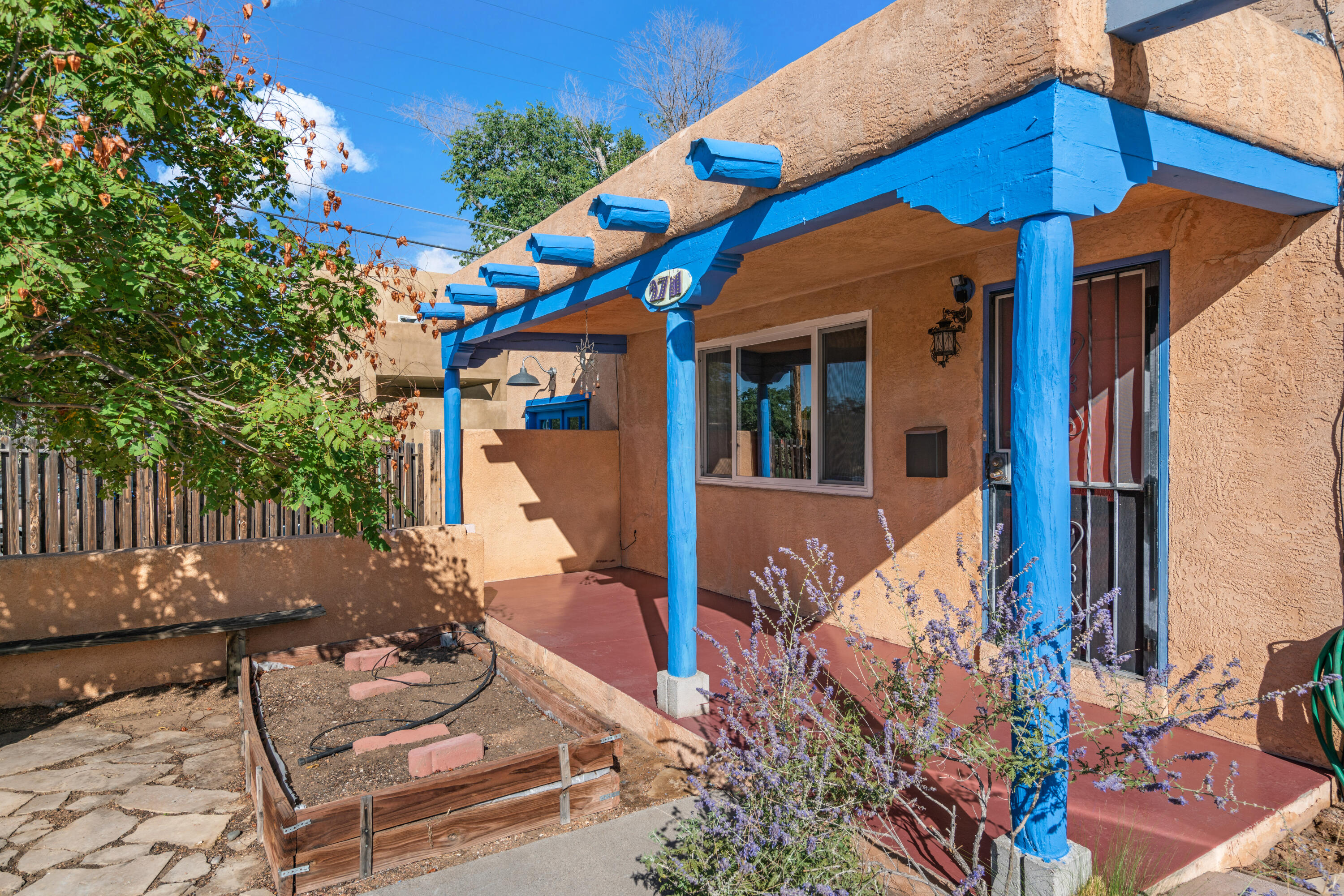 This South UNM pueblo style home is move in ready! This home is in walking distance to UNM, CNM, Nob Hill and Albuquerque's 3 entertainment stadiums. This homes unique style has charm that fits the neighborhood it hangs out in. It is a 3 bedroom/possible 4 with 2 baths. The possible 4th can be an office for the remote work types, an art studio for the artist, or both. The back dinning room has big windows looking out to the back yard letting in a ton of natural light. In the winter you can stay warm with not just 1 but 2 fireplaces. This home is charming as well as versatile. Make this home yours.