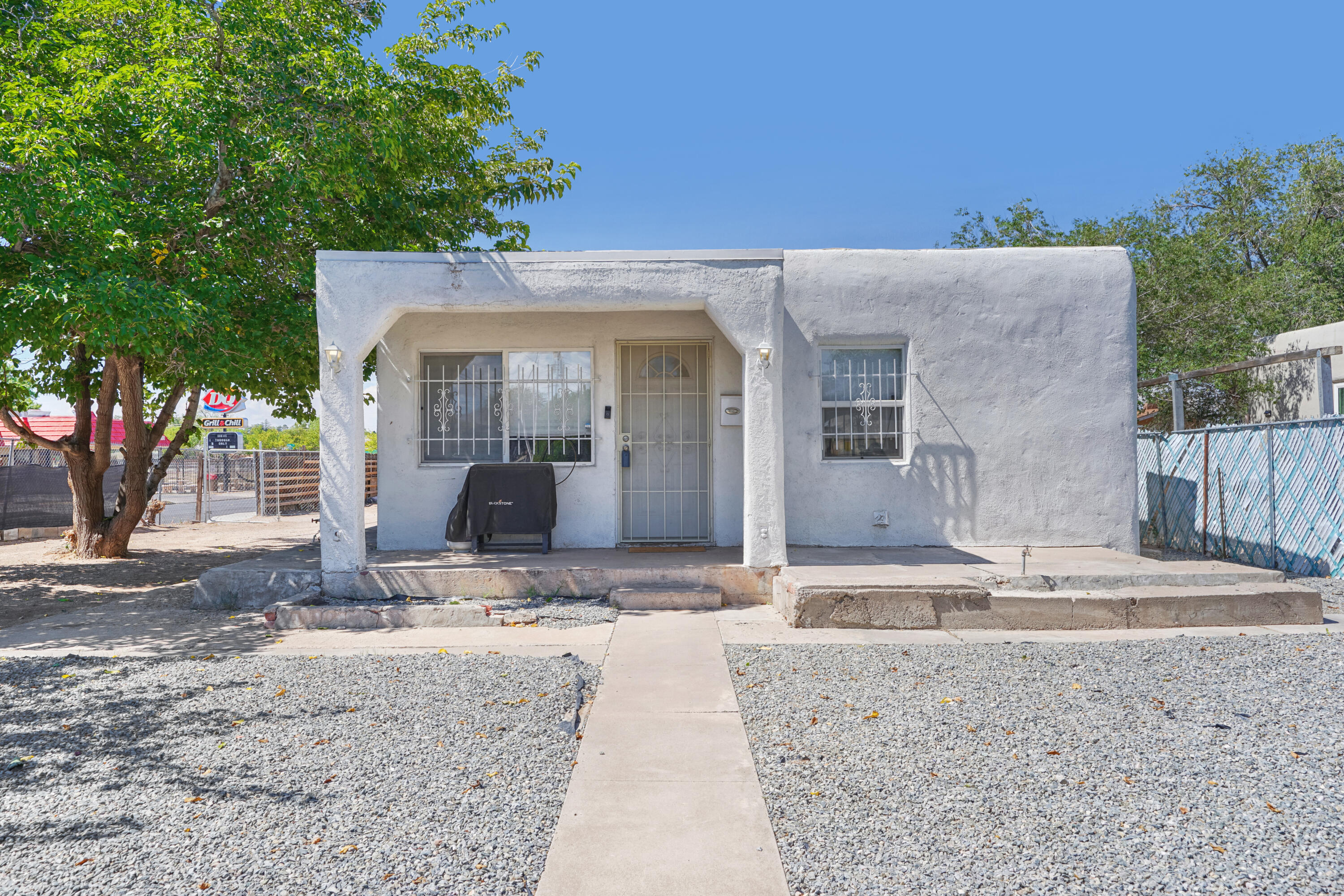 Welcome to this beautifully redone home, less than 10 minutes to UNM.  This home was renovated in 2019 with new flooring, new paint, windows, and a new kitchen and bathroom!  All newer HVAC in 2019 as well with Air Conditioning.  Come see this great move in ready home today!