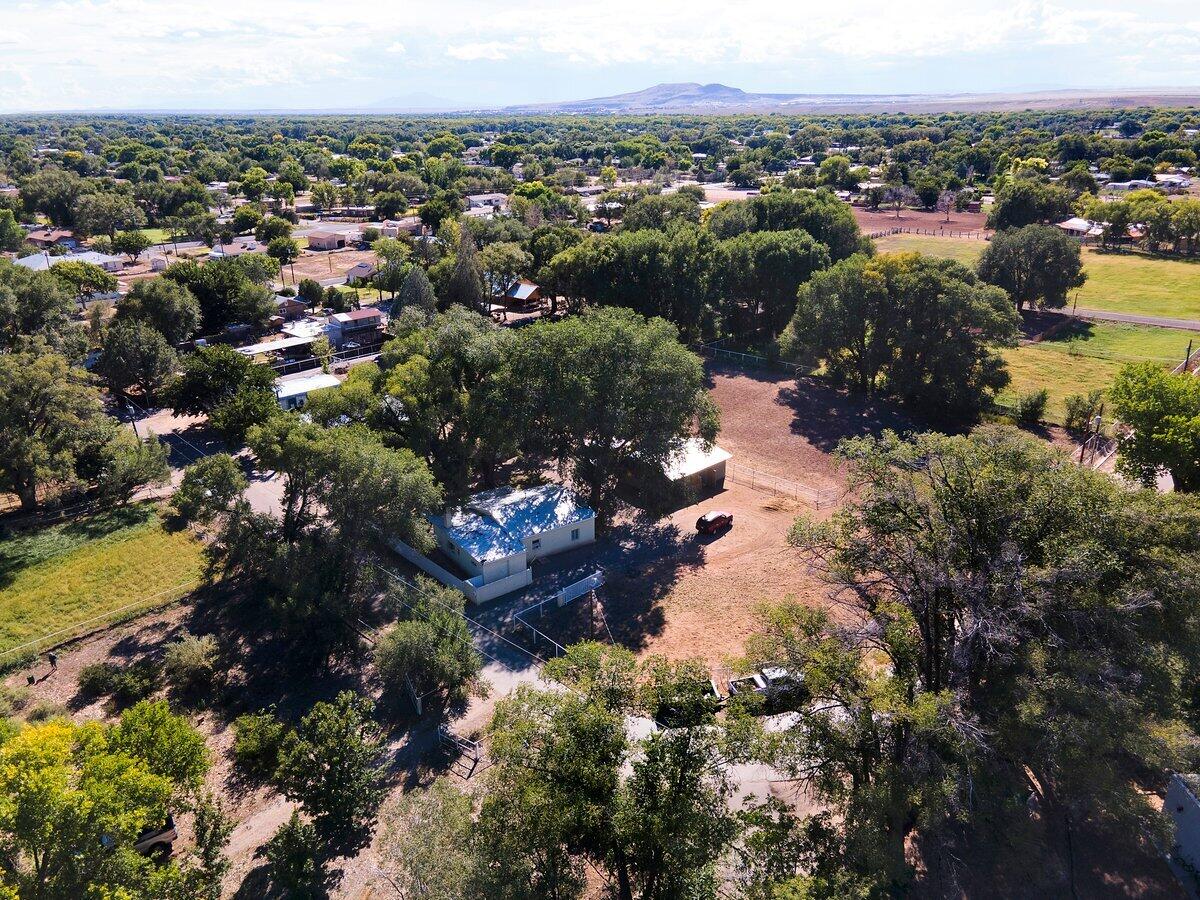 Beautiful home 3 bedroom/2 bath in Bosque Farms, just minuets from the city. Home sits on 2 acres of land, with pipe fencing surrounding property. Plenty of room for horses, with custom built horse barn. This is a home is a must see