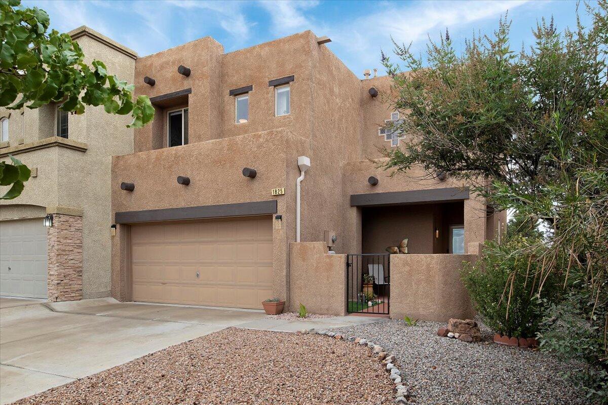 If you're looking for a home close to shopping, schools, medical facilities, and two public parks, then you'll absolutely love this beautifully updated 2 bedroom, 2.5 bath townhome in the highly sought after Astante gated community in Cabezon area of Rio Rancho. This home has been beautifully and painstakingly updated with wood simulated tile, carpet, Pergo laminate floors, interior paint throughout and light fixtures. Upon entering, you'll see the beautiful stacked stone fireplace which provides a cozy atmosphere on cold fall and winter evenings. The updated eat-in Kitchen boasts quartz countertops, stainless steel appliances, and shaker style cabinets. The 1/2 bath on main floor is convenient, too. Upstairs, you'll find a spacious loft with easy access to both bedrooms and guest bath.