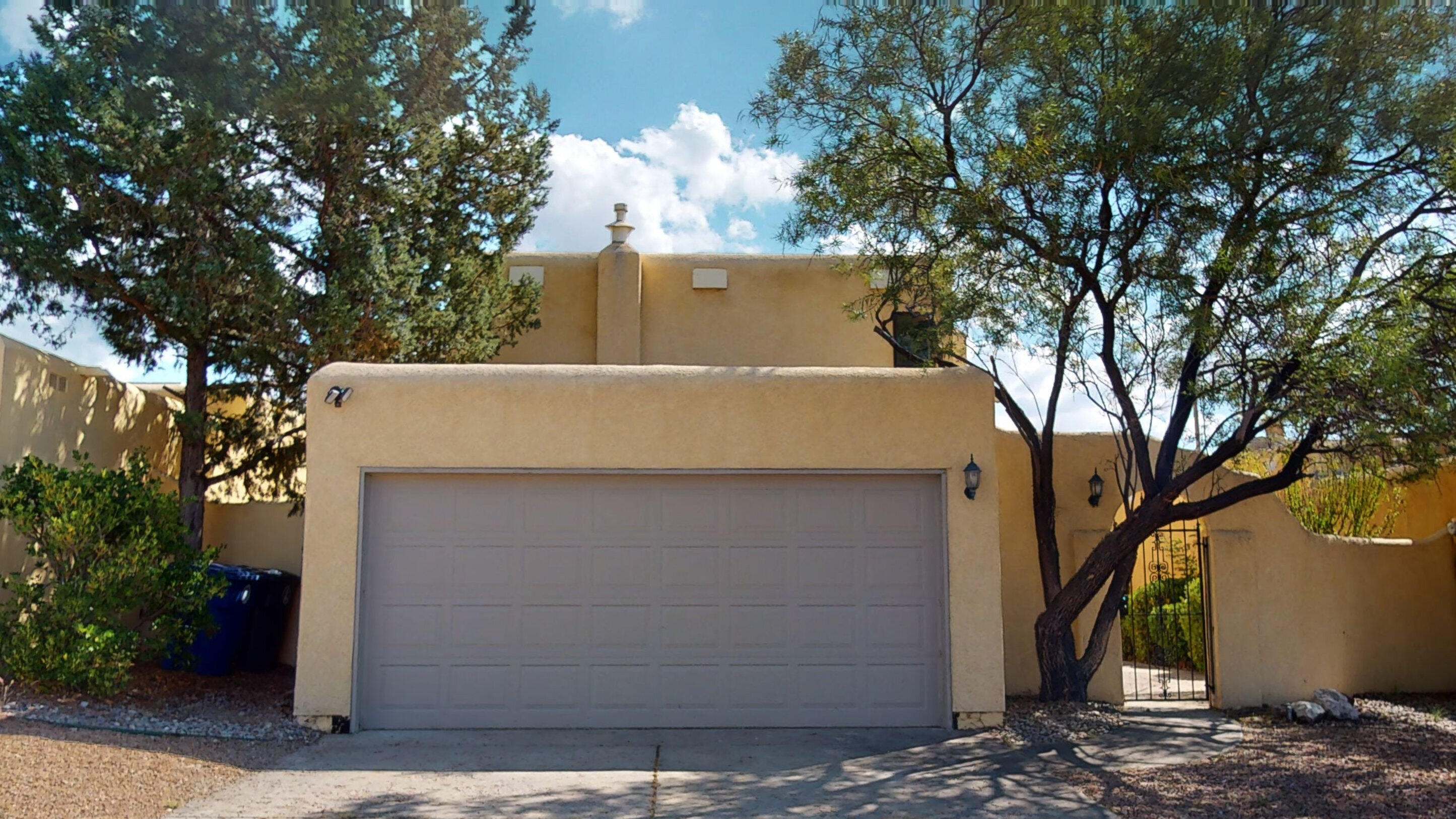 *Open Saturday, 10/8, from 1-3!* Nicely updated home in NE Albuquerque. A charming courtyard greets you as you enter the home with high ceilings in the main living area, porcelain tile, and a cozy fireplace. The remodeled kitchen has a breakfast nook, granite countertops, stainless steel appliances, recessed lighting, and custom cabinets. There is a full bed and bathroom downstairs, with 2 additional rooms and a bathroom upstairs. Fresh paint, newer roof, and finished garage with resurfaced floor.