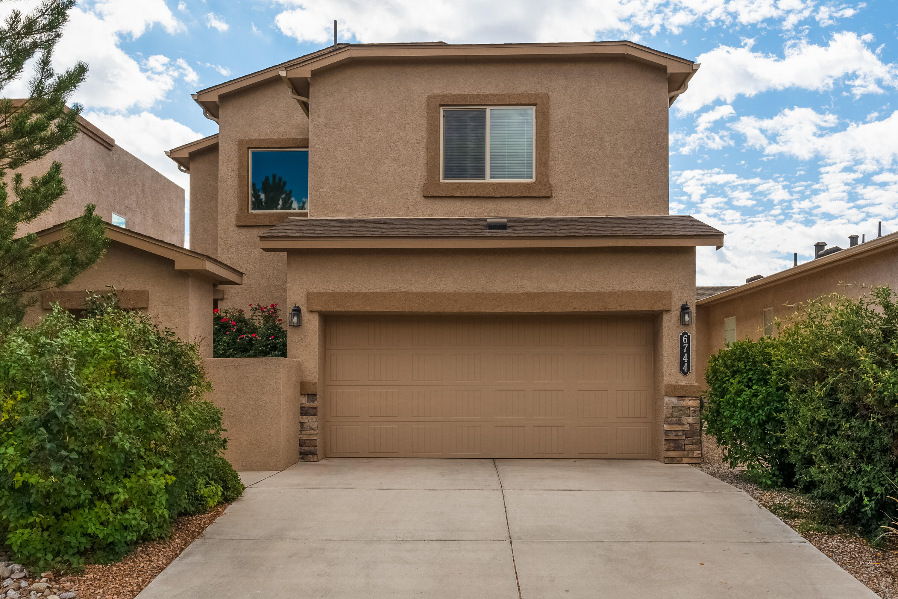 Come check out this stunning 2 story home in The Trails neighborhood. All bedrooms are located upstairs, including laundry. Sit outback and enjoy the beautiful backyard and covered patio!House has easy access to Paseo Del Norte.