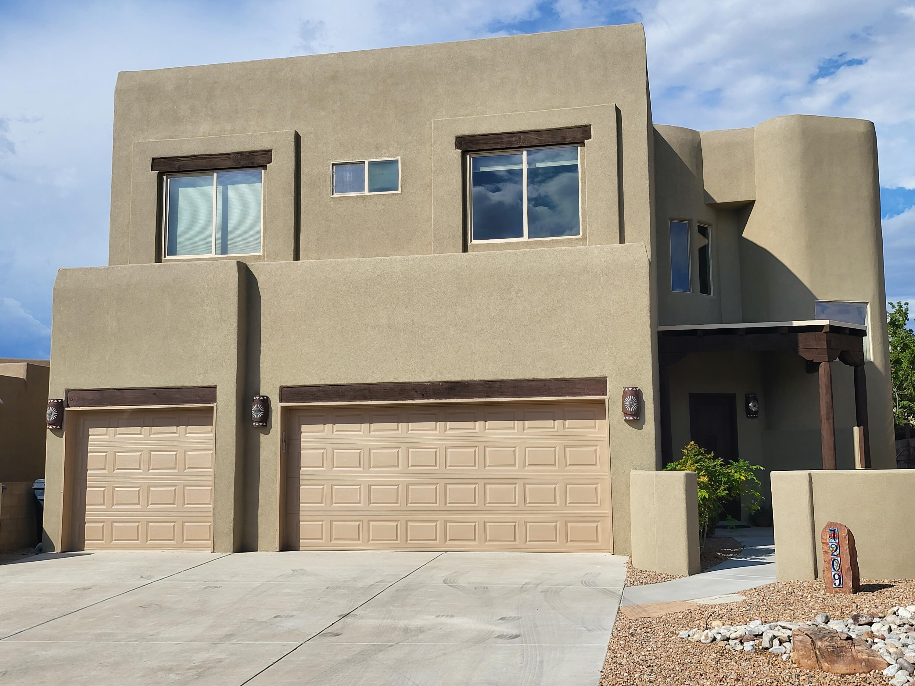 What a great home,  NEW Stucco 2022 ($75k) New TPO Roof 2022 ($46k) New Epoxy garage ($5k). New Carpet ($10K) Tile Floors, Granite counters, S/S appliances, Radiant in floor heat both levels, Refrigerated A/C and Forced Air heat.Main Bathroom is expansive with Large walk-in closet and , jetted tub and walkout deck with Mountain and City Views . backYard Backs Open Space arroyo and has Mountain & City Views .