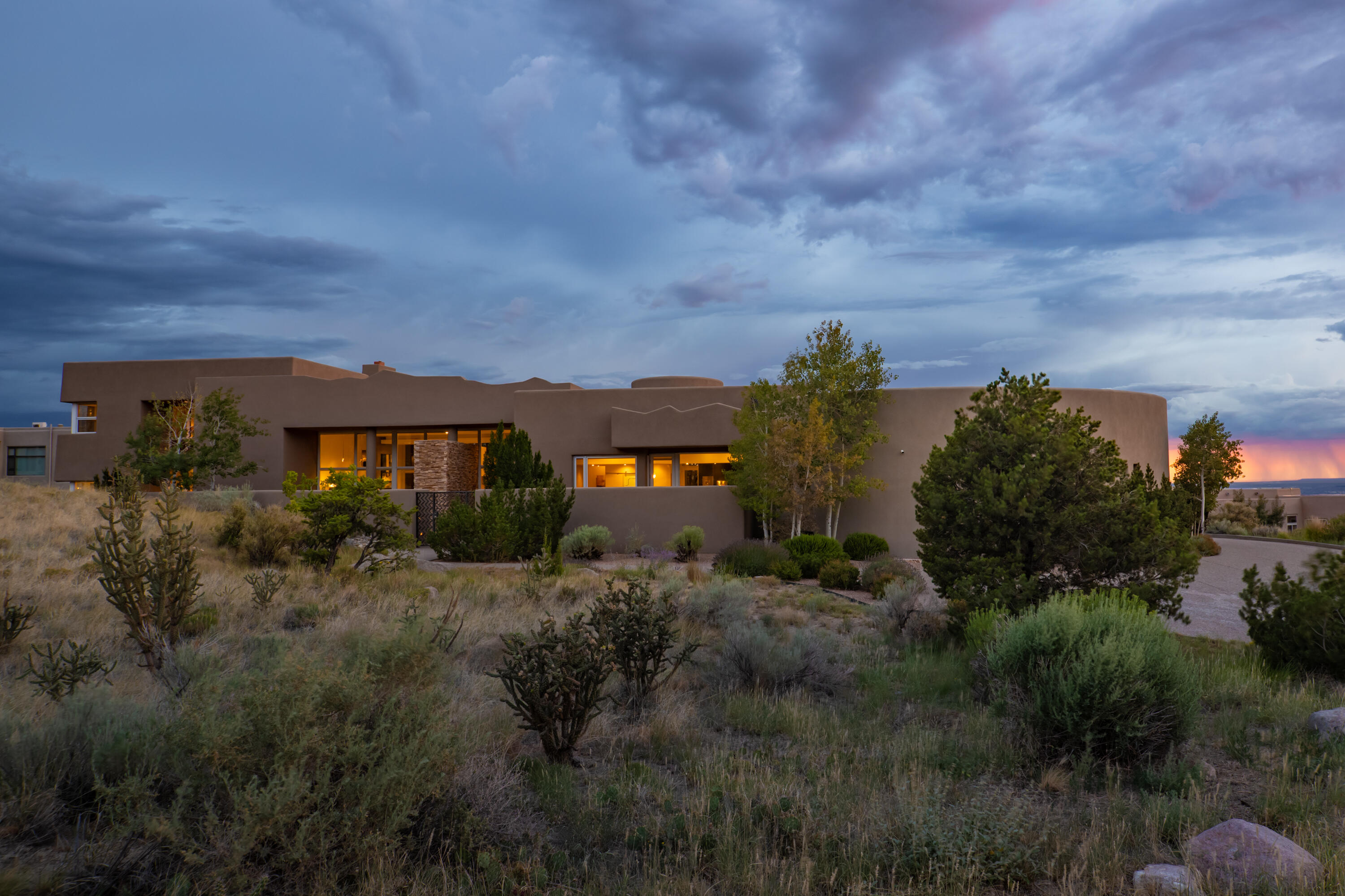 This dramatic homesite is located in a cul-de-sac near the Eastern most point of High Desert, only two lots away from the national forest, offering dynamic views in all directions and unparalleled privacy. Contemporary architecture, clean lines, and floor to ceiling windows allow the views to be the commanding presence. Beautiful high end contemporary finishes and attention to detail define this great home. The floor plan is well suited for a variety of situations with 2 primary suites, one on the main level, and one upstairs, and 2 additional bedrooms on the main level. Contemporary homes rarely enter the market in this location. Enjoy the best of the High Desert lifestyle from this great home with access to hiking, biking and walking trails immediately outside your door.