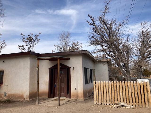 Back on the market, freshly painted! Priced to sell. Historic North Valley adobe home owned by the same family for over 100 years. Property and home have great potential.