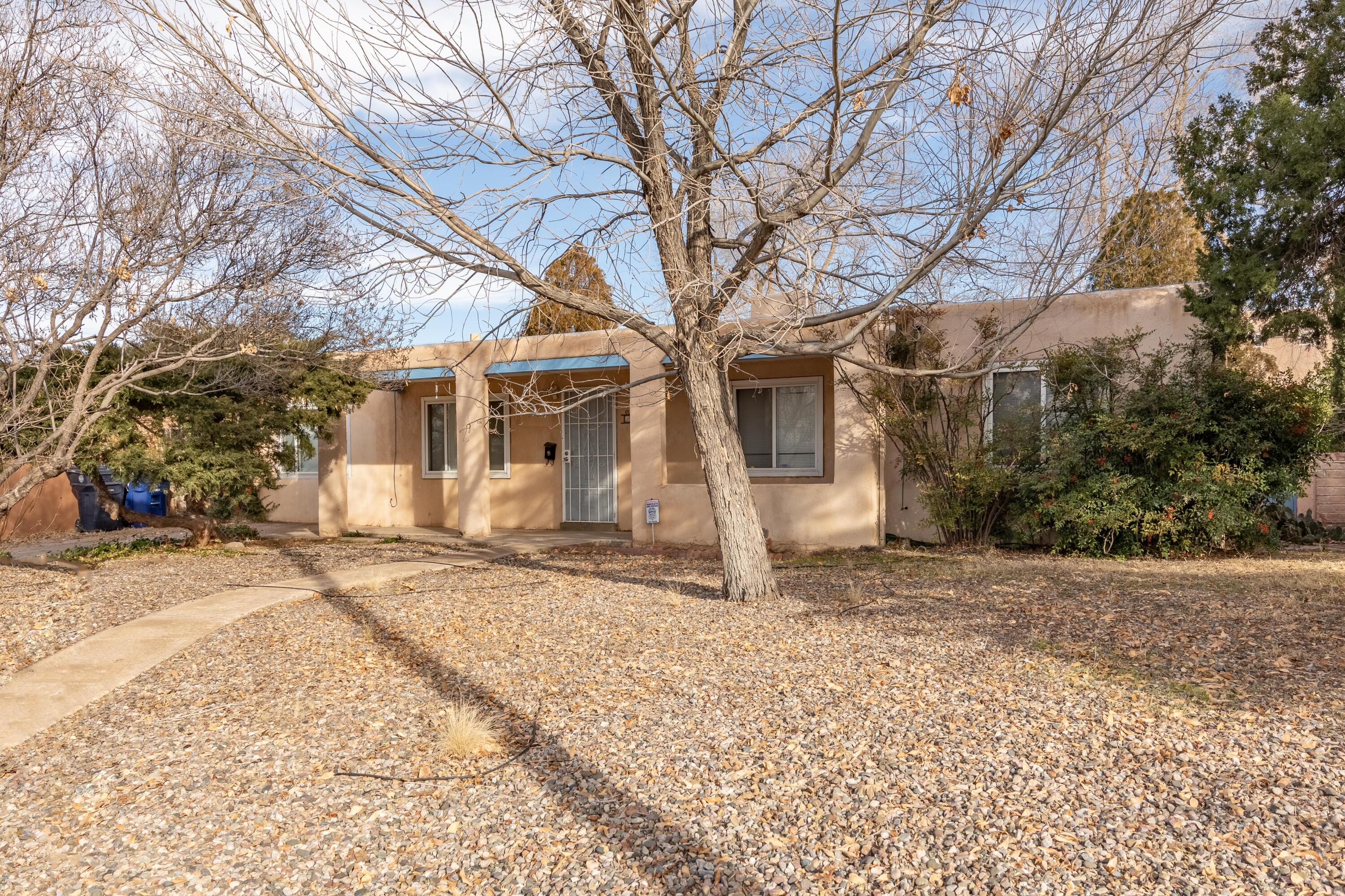 Nice 3 bedroom, 2 bath home with a large back yard. Excellent location in a long established neighborhood close to schools, shopping, restaurants, hospitals, University of New Mexico law school & medical school.