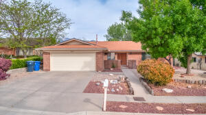 Truly SPECTACULAR!!! This GEM in La Cueva district.  Front double doors open up to a  Family Room, living room and a huge kitchen with a bar for extra seating.  New garage door was in 2021 & A/C/heater/ref air unit. Large Storage shed in back with skylight. Backyard is great for entertaining with a large covered patio.