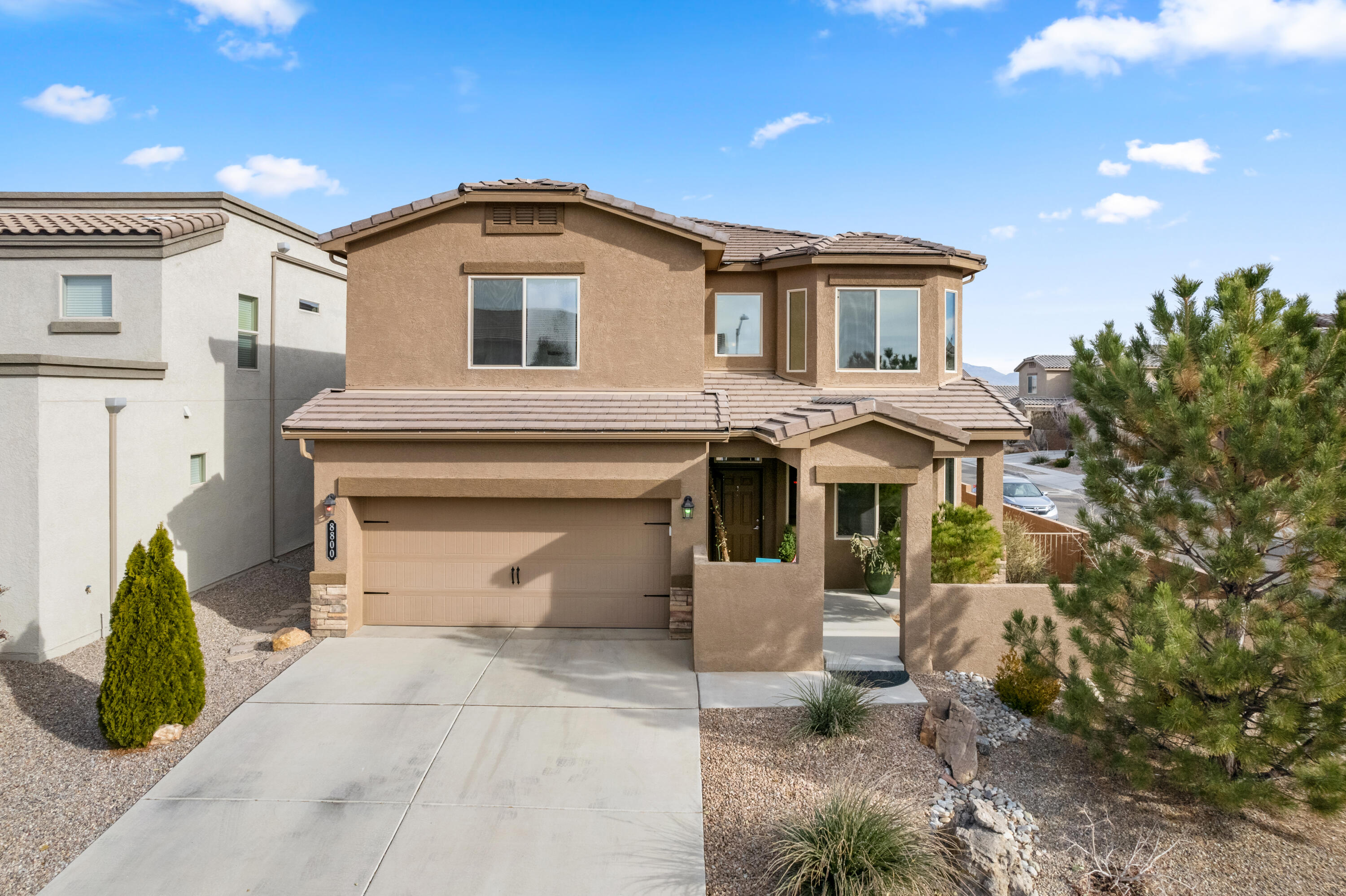 An Alluring 2-Story Home On A Corner Lot Located In The Quiet Tierra Vista Community at The Trails.This Gorgeous 2428 Sq Ft Home Yields 5 BDRMS & 3 Baths,2CG w/ Brand New Door Spring & Nylon Rollers,A Loft,Balcony w/ New Trex Flooring & More!Main Level Offers Bright & Spacious LR/DR Combo Perfect For Small Gathering,Followed By The Kitchen w/ Modern Cabinets,Granite Countertops,Stainless Steel Appliances & A Pantry.A Bedroom & Half Bath to Follow.Upstairs You Will Find The Loft That Leads to the Balcony w/ Excellent Views of The Sandia & Manzano Mountains,The Master Bedroom w/ Walk-In Closet,Ensuite Bathroom w/ Shower & Double Sink.Three More Rooms & A Full Bath to Follow.Outdoors Is Barbeque Ready w/ Walled Backyard & Covered Patio w/ New Acrylic Flooring.Close to Schools, Park &Shopping!