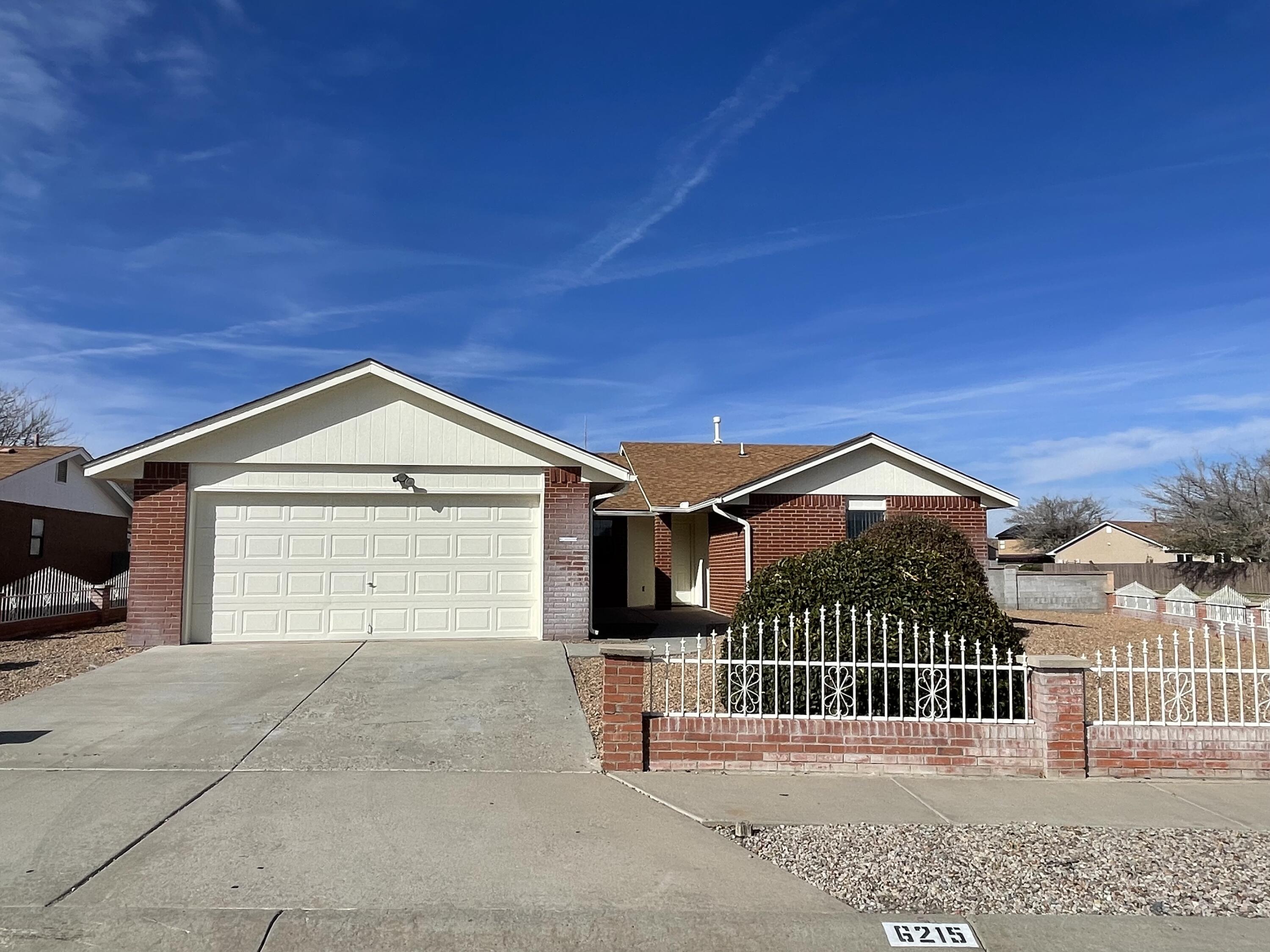 Great price on this all brick home in Taylor Ranch. Fresh paint throughout, ready to move into 4 Bedroom Home near Mariposa Park.  Two car garage and additional paved parking behind home. Refrigerator included. Price reflects flooring needs.