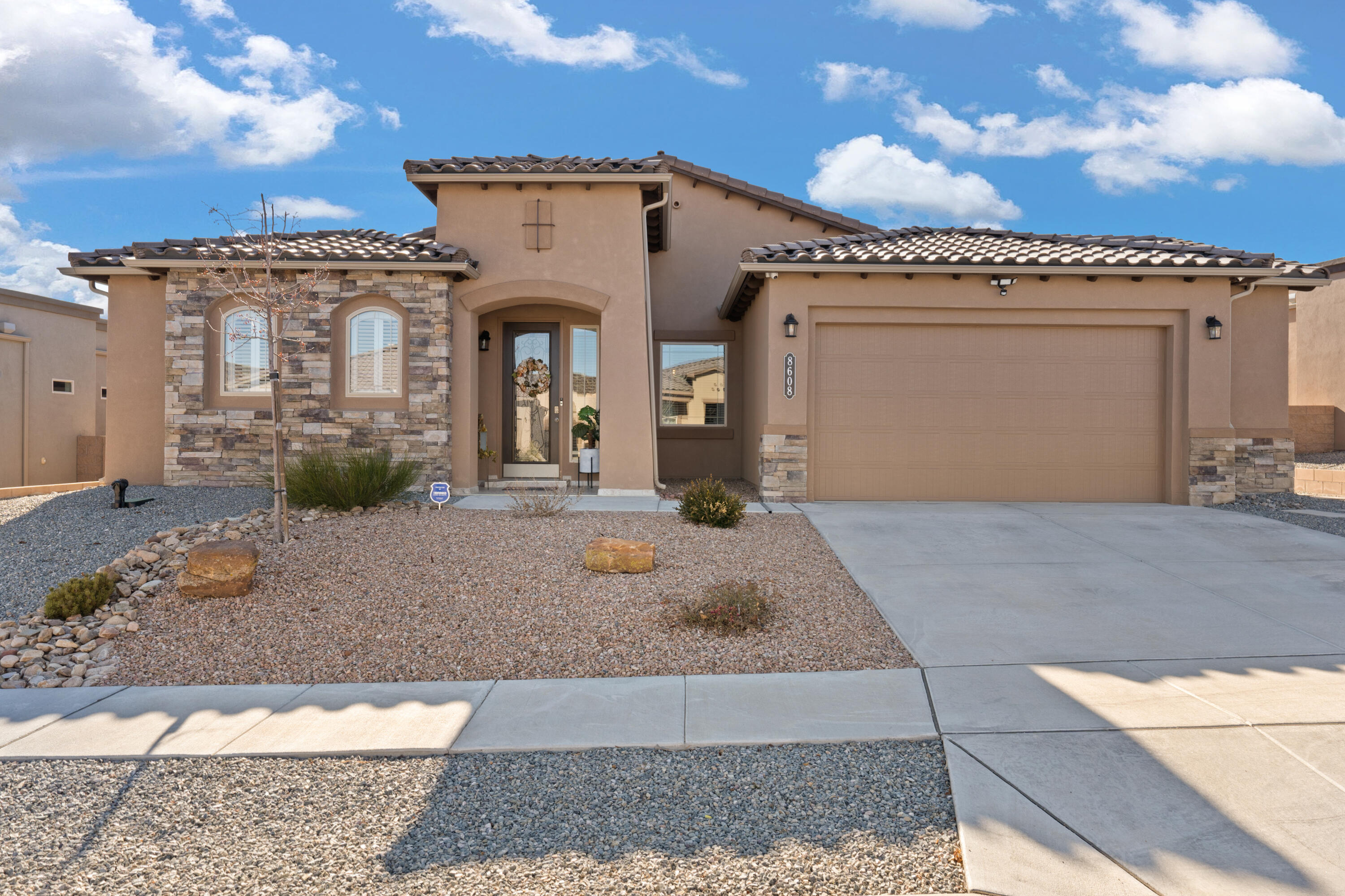Welcome to the beautiful community of Stormcloud! You'll be impressed w/the terrific floorplan, quality, & location! This home offers 2,391 SqFt of living space w/3BR, 2.5BA, 3-car tandem garage, home office & a bonus patio room. Meticulously maintained chef's kitchen w/granite countertops, decorative backsplash, kitchen island w/bar seating, SS appliances, built-in gas cooktop, & a walk-in pantry! The owner's suite boasts custom window shutters, a large walk-in closet, a double sink vanity w/granite countertops & backsplash, separate tub, & a walk-in shower w/a glass enclosure. The backyard is beautifully done w/artificial grass & a stunning outdoor bbq island. Low maintenance, very well-manicured yard all around. This home has an estimated $68k in upgrades. Stunning in every way!