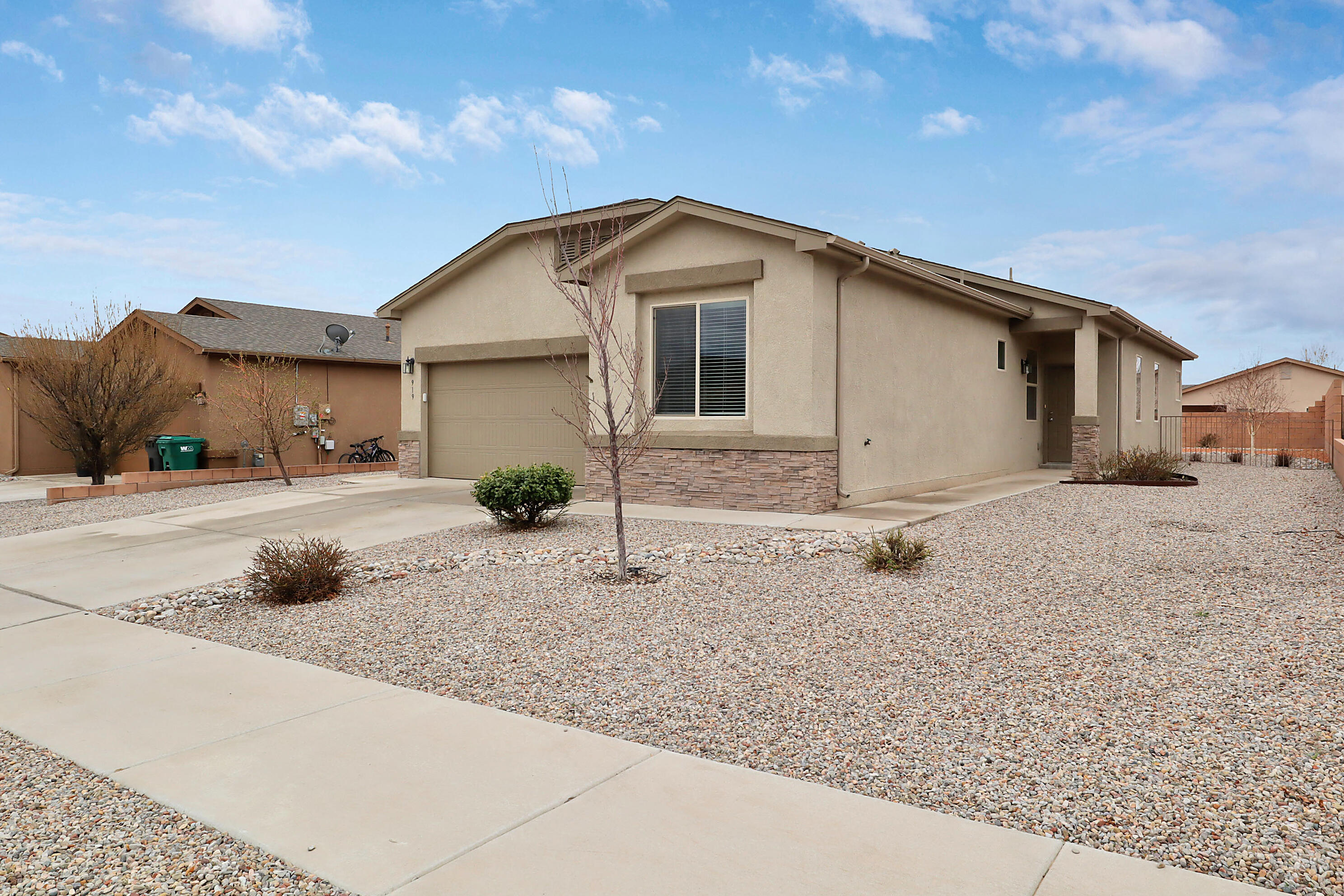 Welcome home!  An open floorplan awaits you to enjoy living and entertaining in this DR Horton built home.  Spacious primary bedroom with walk in closet.  The ensuite primary bath has double sinks with instant hot water,  separate garden tub and shower. Eat in kitchen with a nice size island.  Granite  counters throughout.  Walk out onto the covered patio with views of the Sandia's from the back yard.  Xeriscaped front and back for water conservation.  The study could easily be converted to a 4th bedroom.   All appliances are negotiable.  Water softener is owned and conveys.