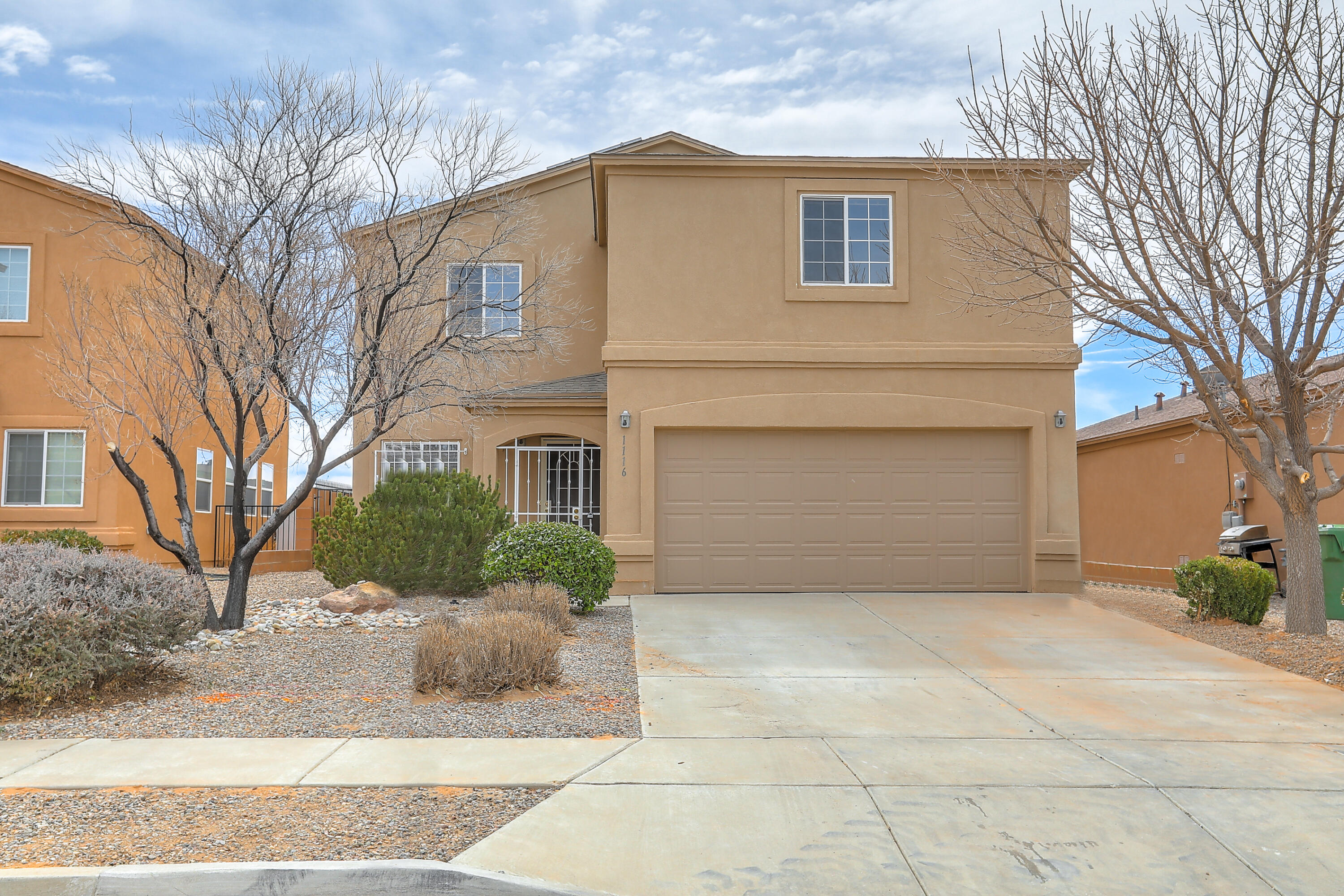 This spacious 4 bedroom/2.5 bath Rio Rancho family home is located in the popular Nothern Meadows neighborhood in the highly rated RioRancho school district. This two-story floor plan has an open layout kitchen, dining and features two spacious living areas. Enjoy new carpet and fresh paint onthe lower lever. Upstairs you will find a spacious loft. The bedrooms are roomy with nice walk-in closet in the primary bedroom. Home has solar panels that areowned not leased, making it efficient with very low electric bills. Garage has a garage screen door which is nice when working on projects in the garage. Securitywrought iron at front and back doors and on lower-level windows.