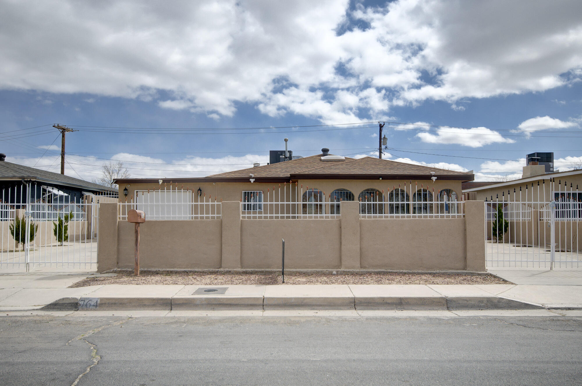 Come take a look at this 4 Bedrooms, 2 Bath, 1 Car garage beautiful home in NW Albuquerque! Great location with easy access to highway,shopping,Aquarium, Downtown and more. Also has a Guest House (not included in sq ft) and a huge storage/hobby room w/electricity. Wrought Iron,High Walls, and completely gated for extra security.Backyard access. Refrigerated A/C Low Maintenace.