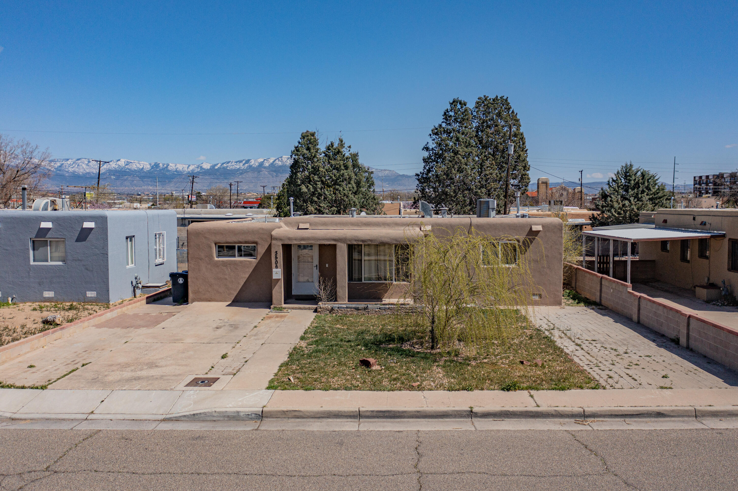 Mountain Views! Welcome to this lovely North Valley home across from Garfield Middle School and close to shopping/entertainment. The bright and open living room has been freshly painted with newer floors though out. Bonus room can also be used as a family room, 3rd bedroom or office space. Exterior features a large back yard, newer stucco, attached workshop and brand new patio cover with electricity. Additional driveway for your toys.
