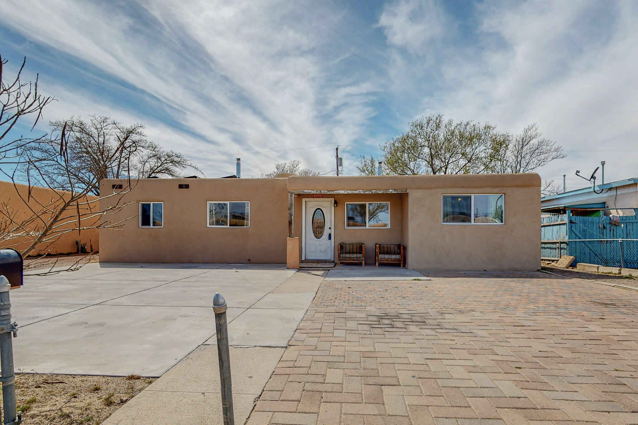 Quaint pueblo-style charmer features three bedrooms and one bathroom located  close  to restaurants, shopping, schools and other community amenities.Nice kitchen with a gas stove and conveying refrigerator.  Good size backyard.  Make it yours, make it home!
