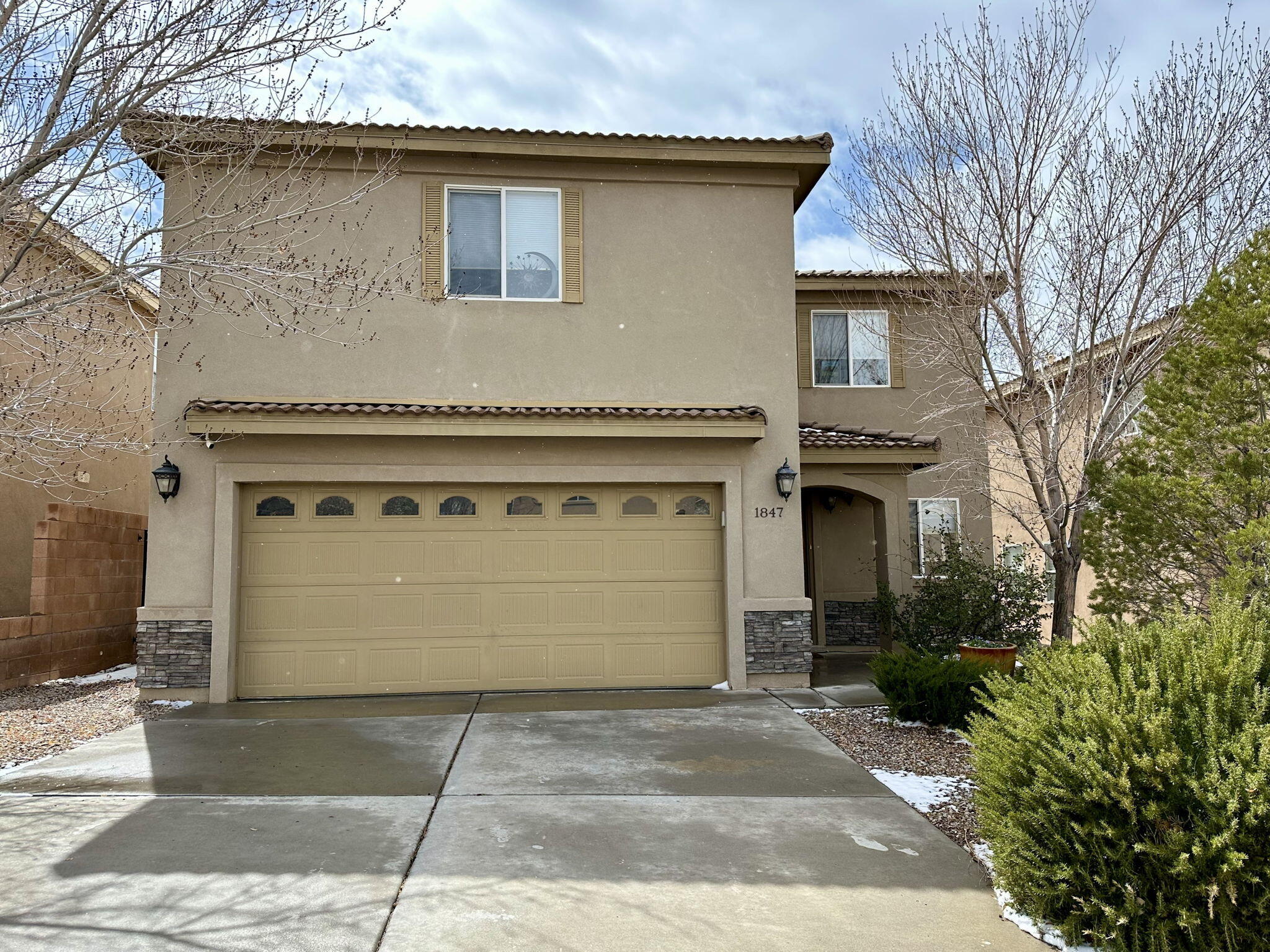 This home is a must see! Kitchen fully remodeled 2 years ago with updated appliances, cabinets and counter tops. Enjoy the spacious owner's suite with primary bath including a jet tub. Relax and enjoy the sunset from the South facing balcony. Home features wood tile flooring downstairs, a new Rheem AC furnace installed April 2021 and a 220V outlet to charge an electric car. Close to Kirland Airforce, Sandia Labs and 140 for easy highway access. Washer, Dryer, detached electric fireplace, backyard table and sofa convey.