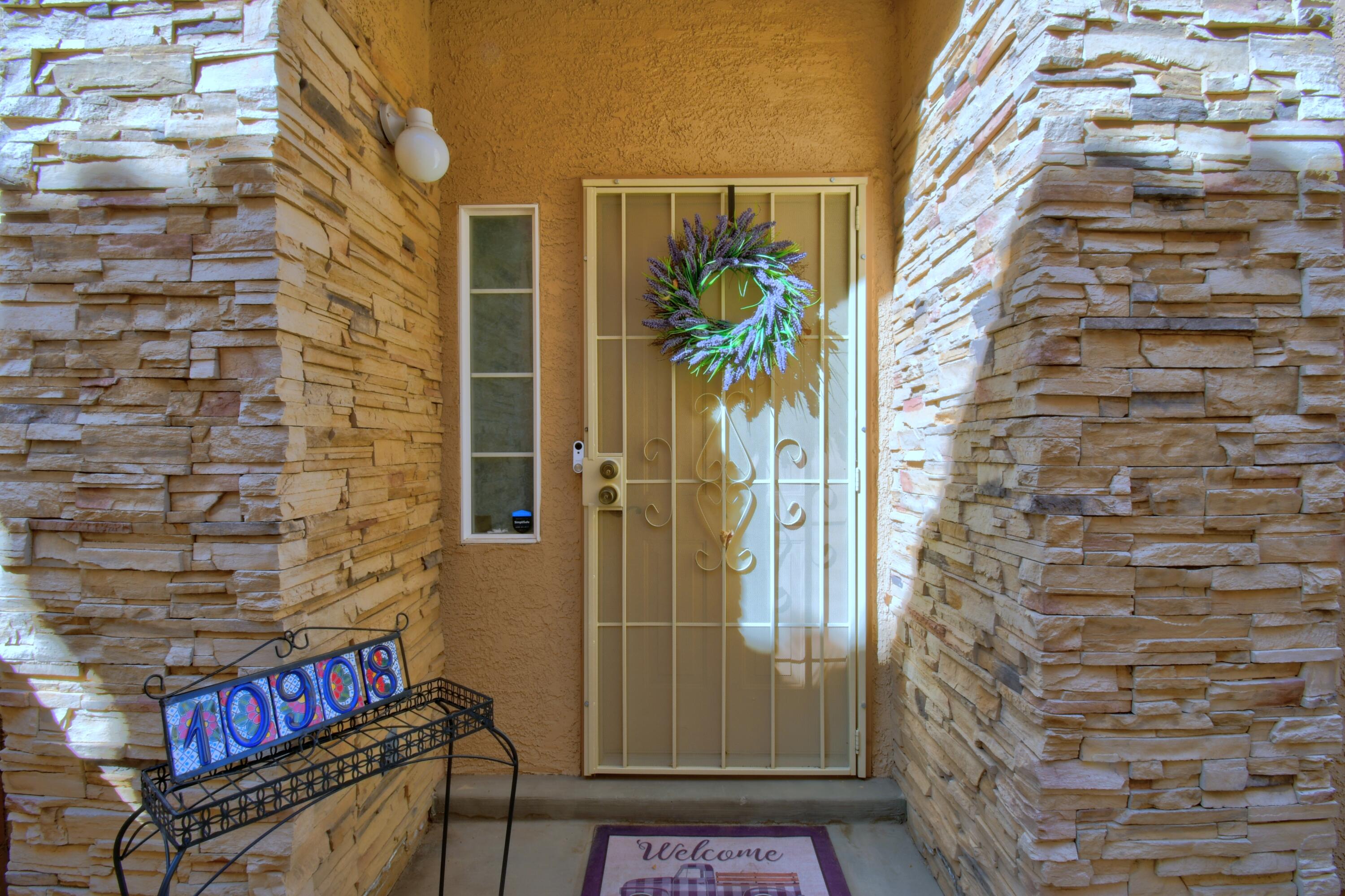 Walk in entry on ground level open bright floor plan located in the wonderful gated Casa Pacifica neighborhood. This home has been beautifully updated which include the kitchen countertops updated to Cambria Montgomery Quartz, designer backsplash, plumbing fixtures, stainless steal sink, kitchen pulls, kitchen also includes  Whirlpool stainless steel appliances. Updates also include designer paint,,doorknobs, & light fixtures. Great room includes cozy fireplace and laminate wood flooring. Tile in all wet areas and carpet from steps up through second floor. 2nd floor includes two primary bedrooms each with their own full bath and walk-in closets.  Courtyard includes planter box and open patio perfect for summer.