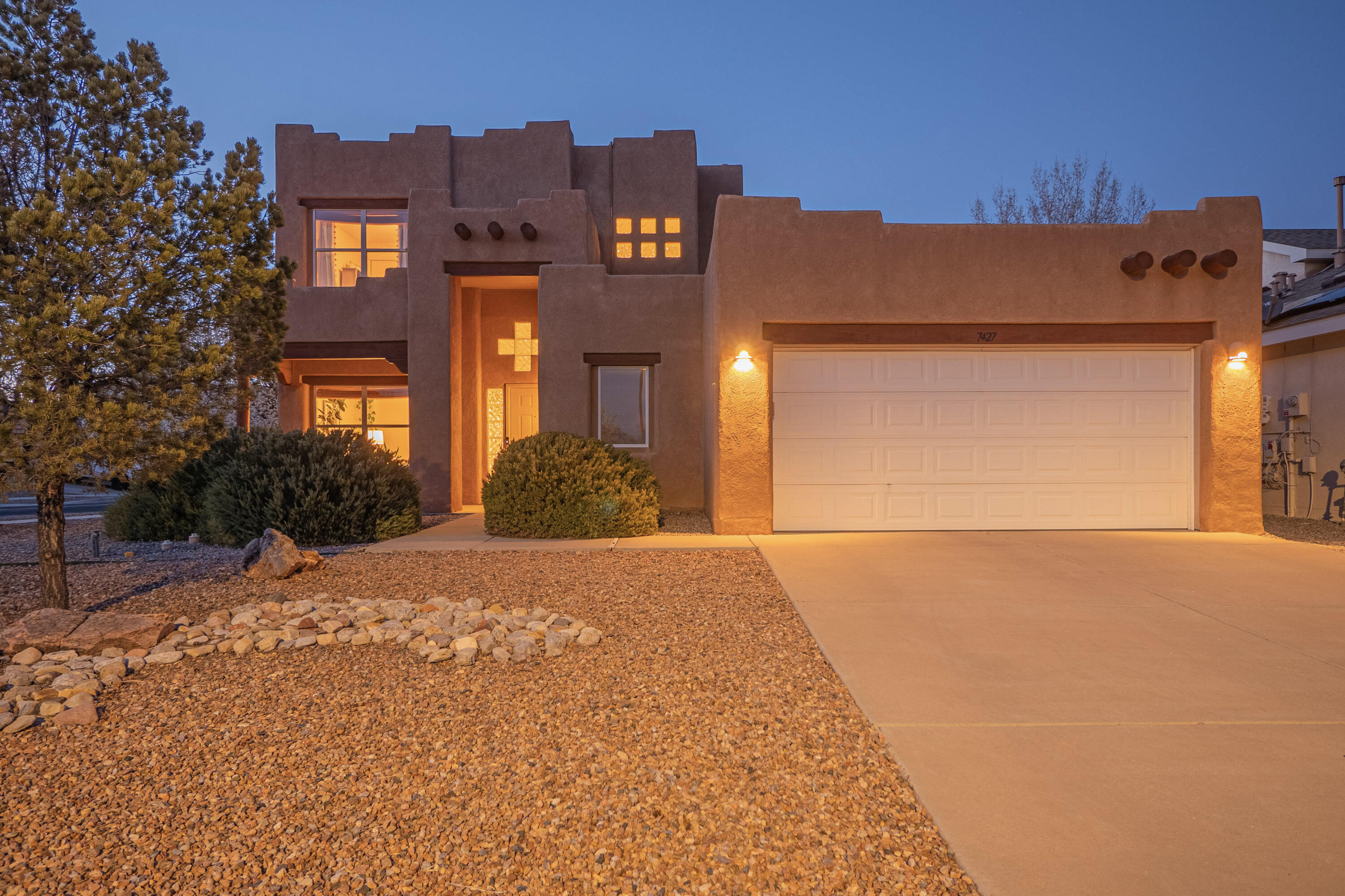 WOW!!! This is the home you have been waiting for! Absolutely stunning home nestled in the desirable Ventana Ranch community with HOA Pool, on a sought-after cul-de-sac with views of the Sandias, tree lined street, that's close to parks and so much more! This beautiful home has so much to fall in love with and it starts with plenty of space for the whole family. Large 3 bedrooms, front office/formal dining, cozy family room to nestle up next to the fireplace with family and friends. Large 2nd Family Room upstairs.  Kitchen has ample storage and counter space. Warm wood tone floors and beams bring comfort and charm! Have peace of mind with a NEW TPO Roof '21! Breathe easy with a