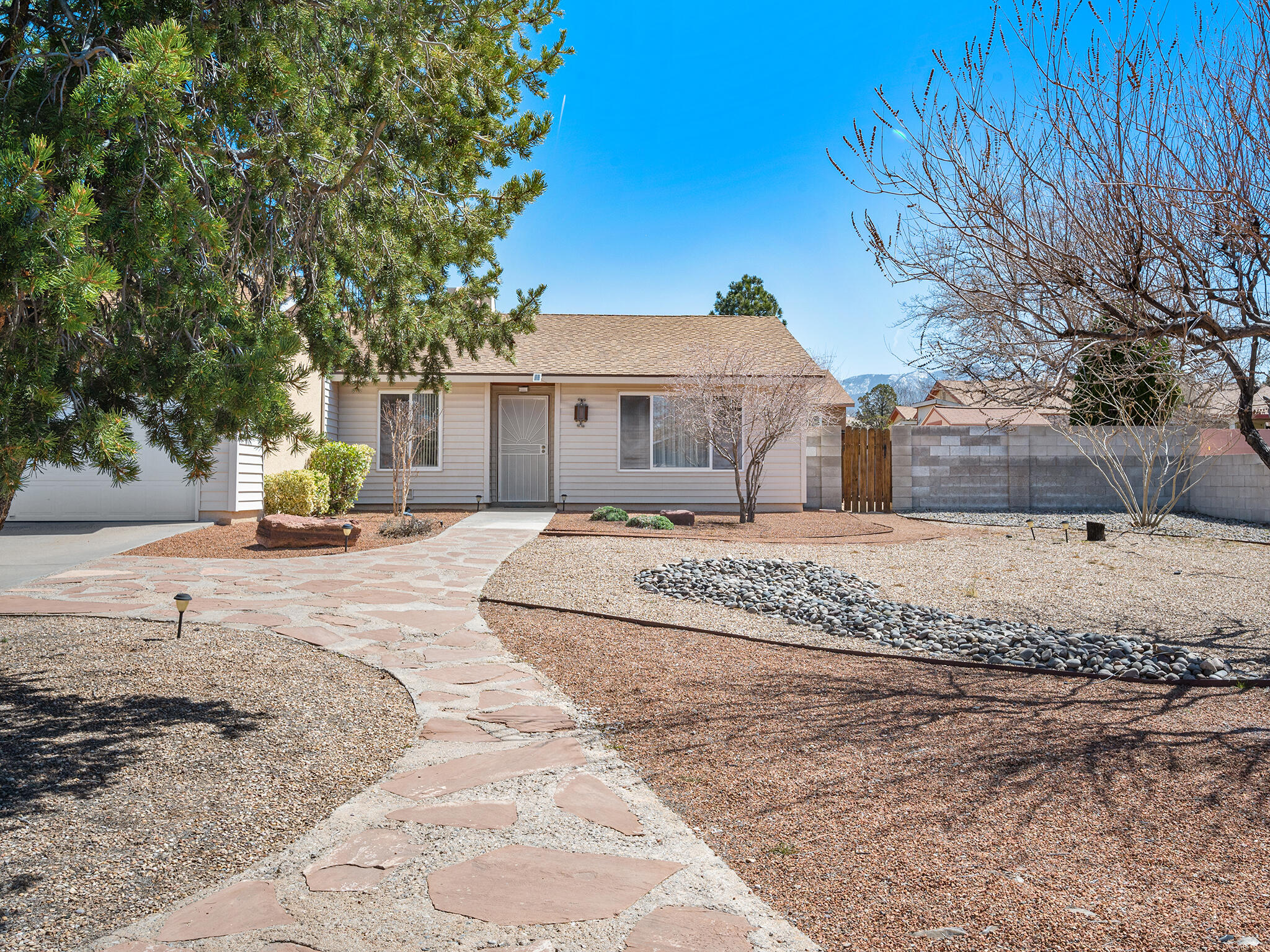 This property has never been just a house, it's always been a home.  The pride and care this original owner has taken is evident everywhere.  A sleek 70's model with a nice interior remodel which opened up the living areas. During the remodel 1 bedroom was converted to an office, need another bedroom? Easy to convert back! A .23 acre lot on a large cul-de-sac, mere minutes by car to ABQ Academy, Whole Foods Market Center, lot's of great restaurants, easy interstate access.. Fully landscaped/Xeriscaped front/backyard; all you need to add is garden beds, playground, hot tub, whatever! In addition to the Tuff shed there is a fenced private area for additional storage.Concerned about condition? Don't be! Full Pre-Listing Home Inspection done on 3/29 Bring the love that's all this home needs!
