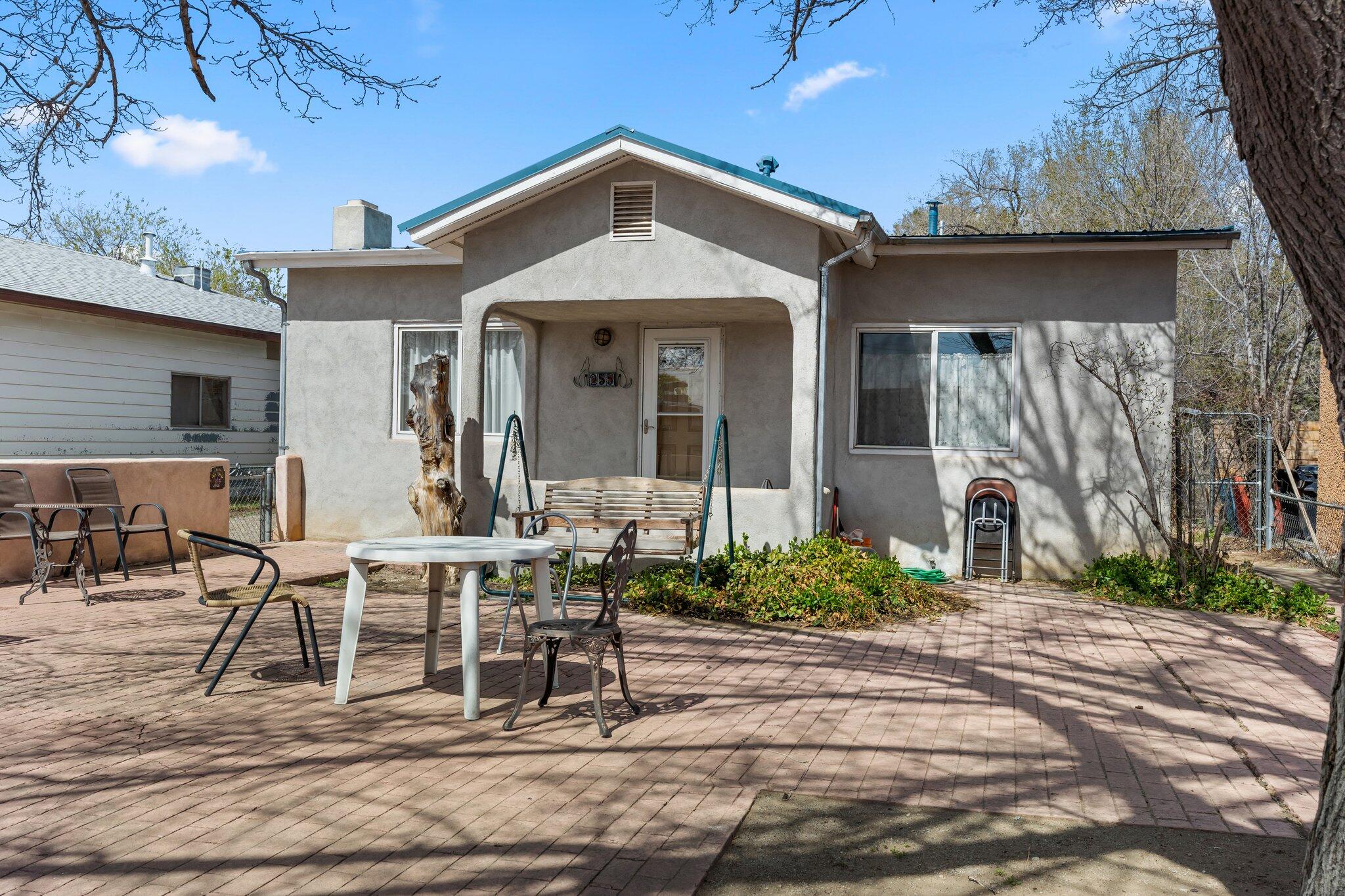 Cozy North Valley Home located centrally. Home boasts of beautiful Oak/maple/pine wood floors, new  roof in 2021, new water heater 2019, new kitchen appliances 2019 windows,  fresh paint in the in laws quarters and fireplace, home was painted in 2019 . New faucets in kitchen, new wall heater in laundry room. Spacious back yard  with a blank canvas. In laws quarters provides a opportunity for income. Utility room includes a photo lab for budding legacy film photographers which includes water and electricity and water.