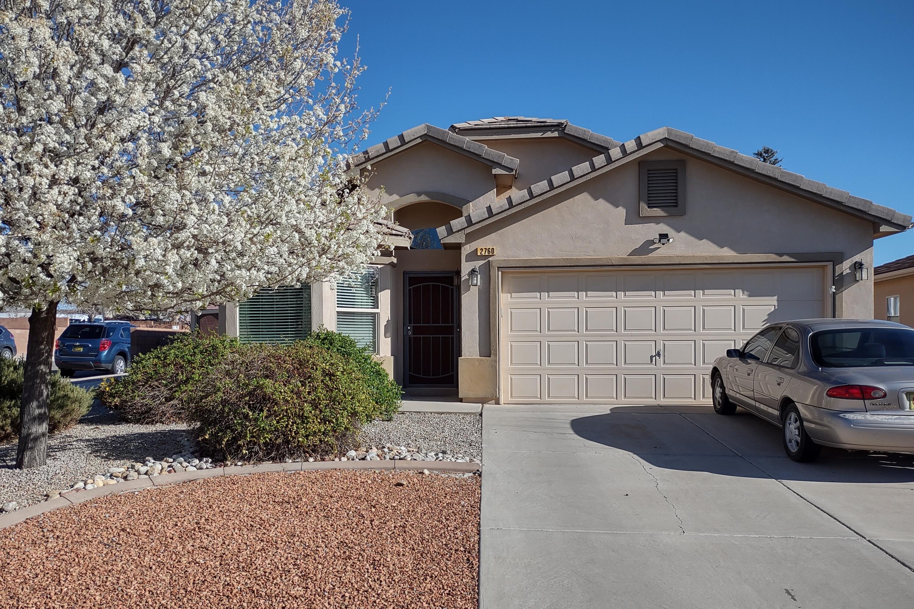 This lovely 4 bedroom home is located in the Cabezon neighborhood on a corner lot with mountain views. The home has two spacious living areas, perfect for entertaining guests. The kitchen has an island, pantry, dining area with a modern light fixture and stainless-steel appliances. From the family room, you can access the backyard which features a covered/open patio and hot tub and views of the mountains. The spacious master suite has a walk-in closet and bath with garden tub and separate shower. Additional features of this home include a two-car garage and a separate laundry room with washer and dryer. With its great location, spacious layout and beautiful mountain views, this home is sure to be a place that the whole family will love.